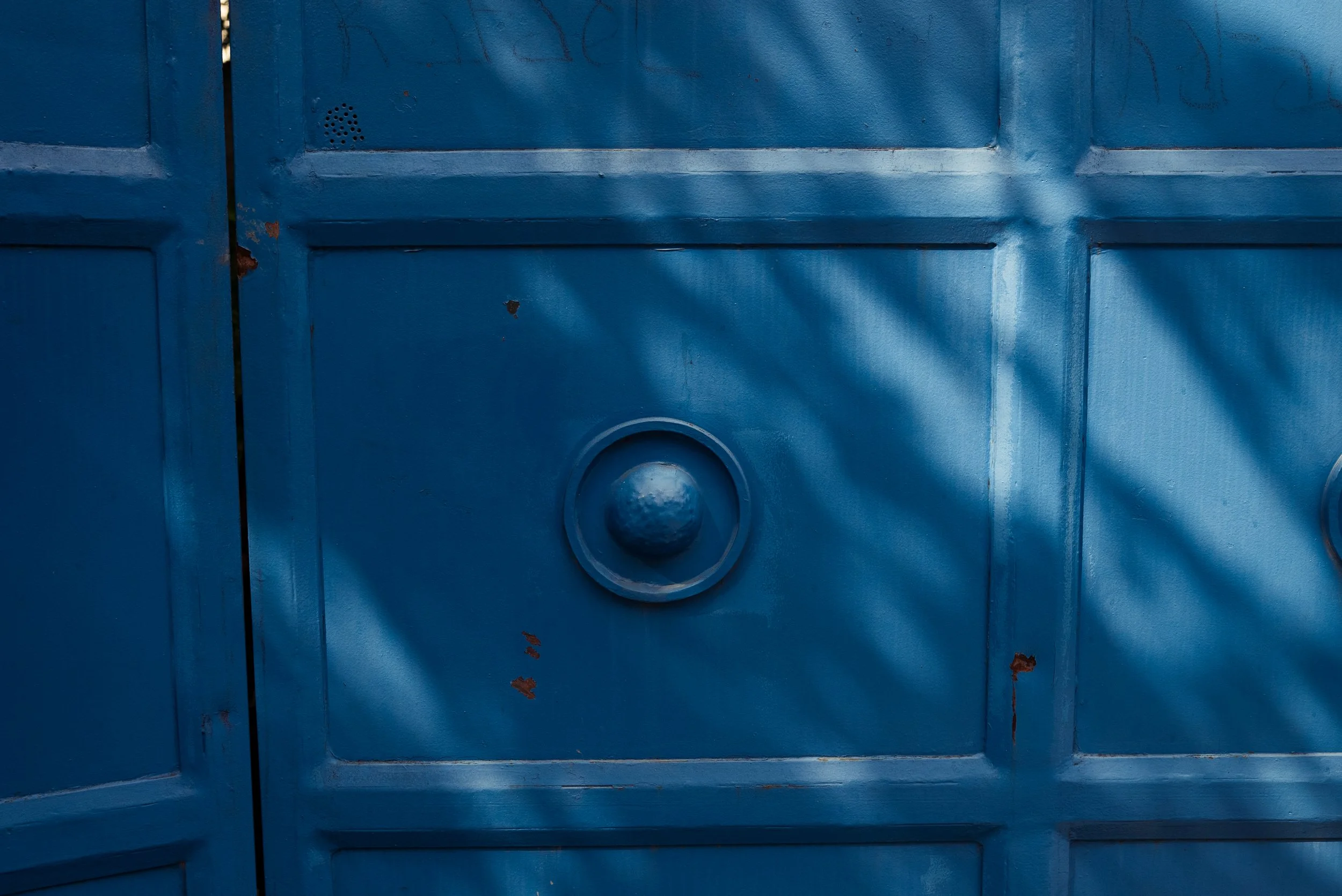 Gunshot marks on the gate of The National Network of Human Rights (RNDDH) in Port-au-Prince.