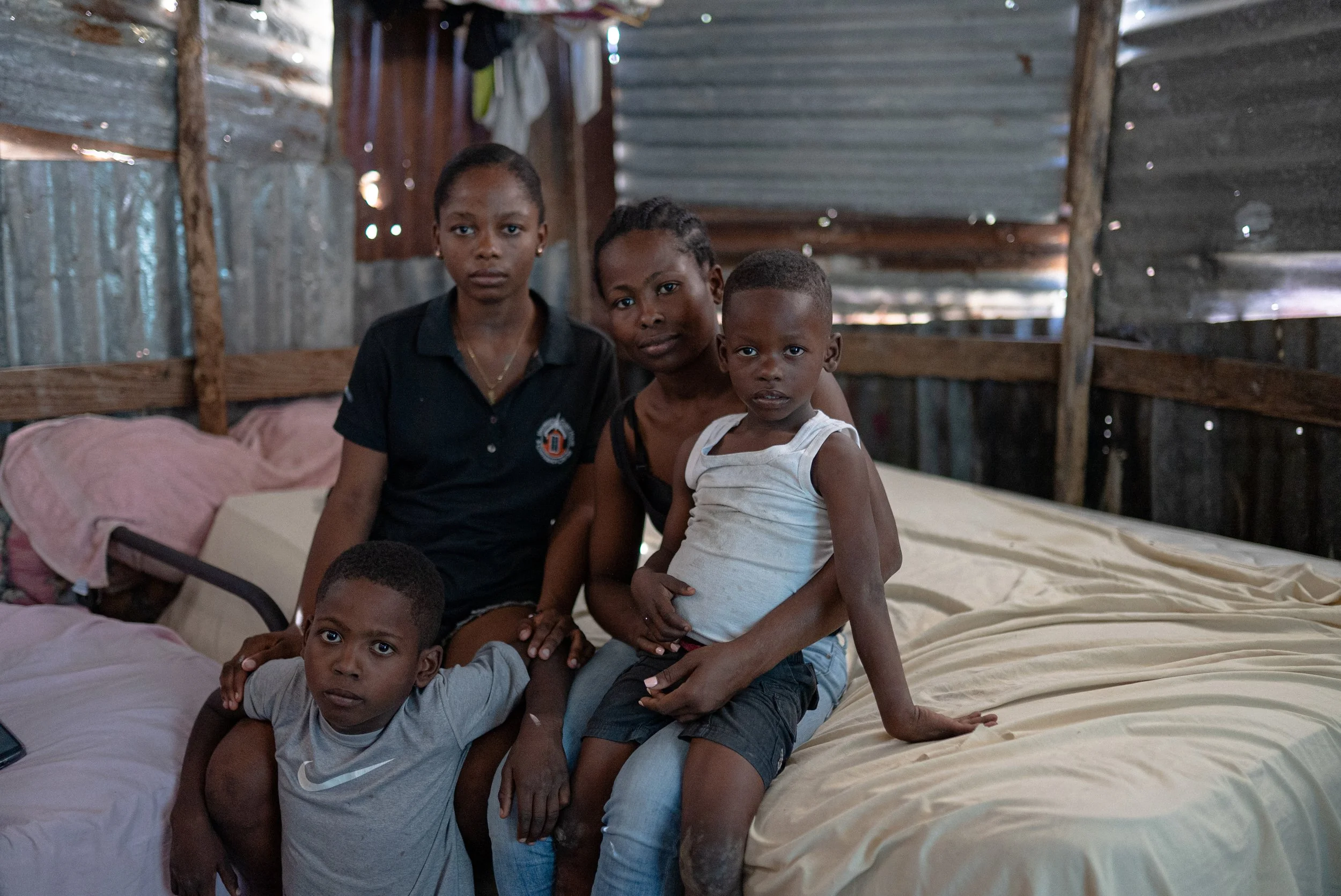 Onite Charles, 30, is the mother of three and recently widowed after her late husband Johnny Alexis, 33, a motorcyle taxi driver, was killed after being caught in crossfire between armed groups and police officers in downtown Port-au-Prince, Haiti.