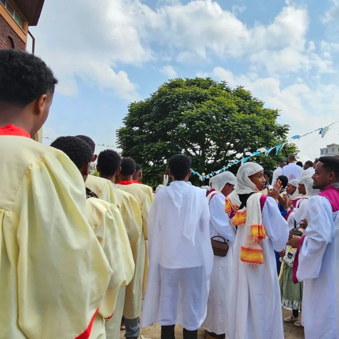 choir+getting+ready+to+enter+the+church.jpg
