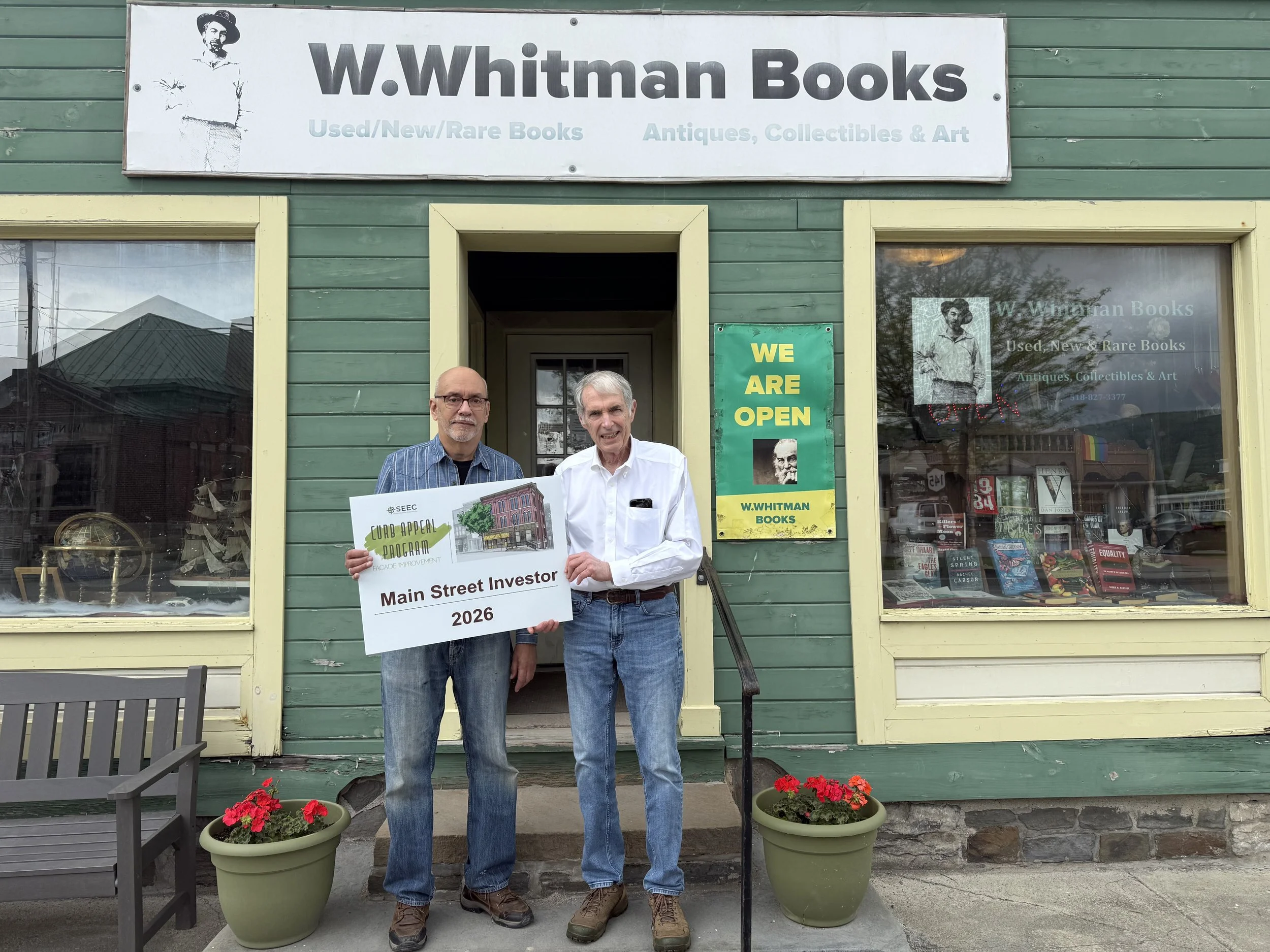 Doug and Peter with sign outside.jpeg