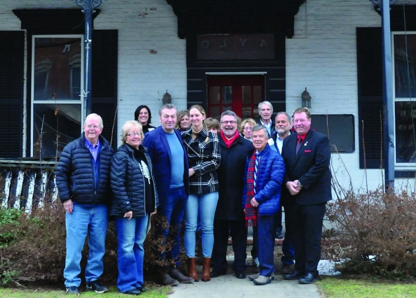 Investors and owners infront of the Parrott House