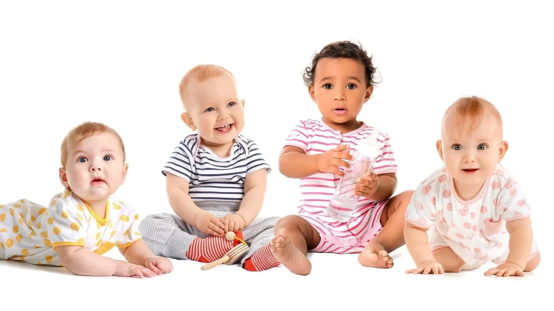 4 babies, 1 on belly, 2 sitting, 1 crawling