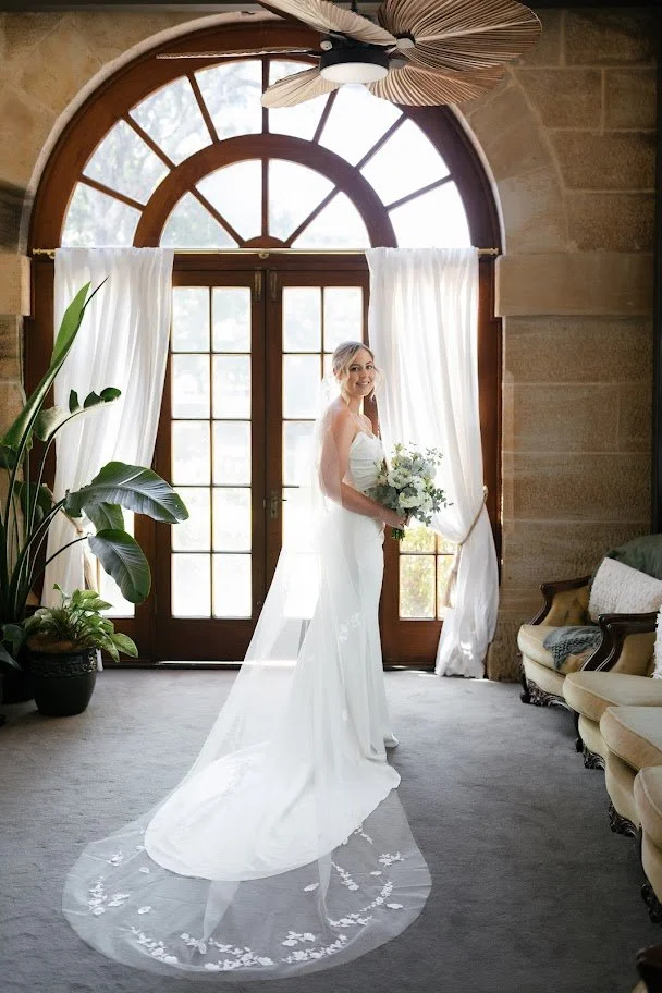 Bride in perfected wedding dress alteration