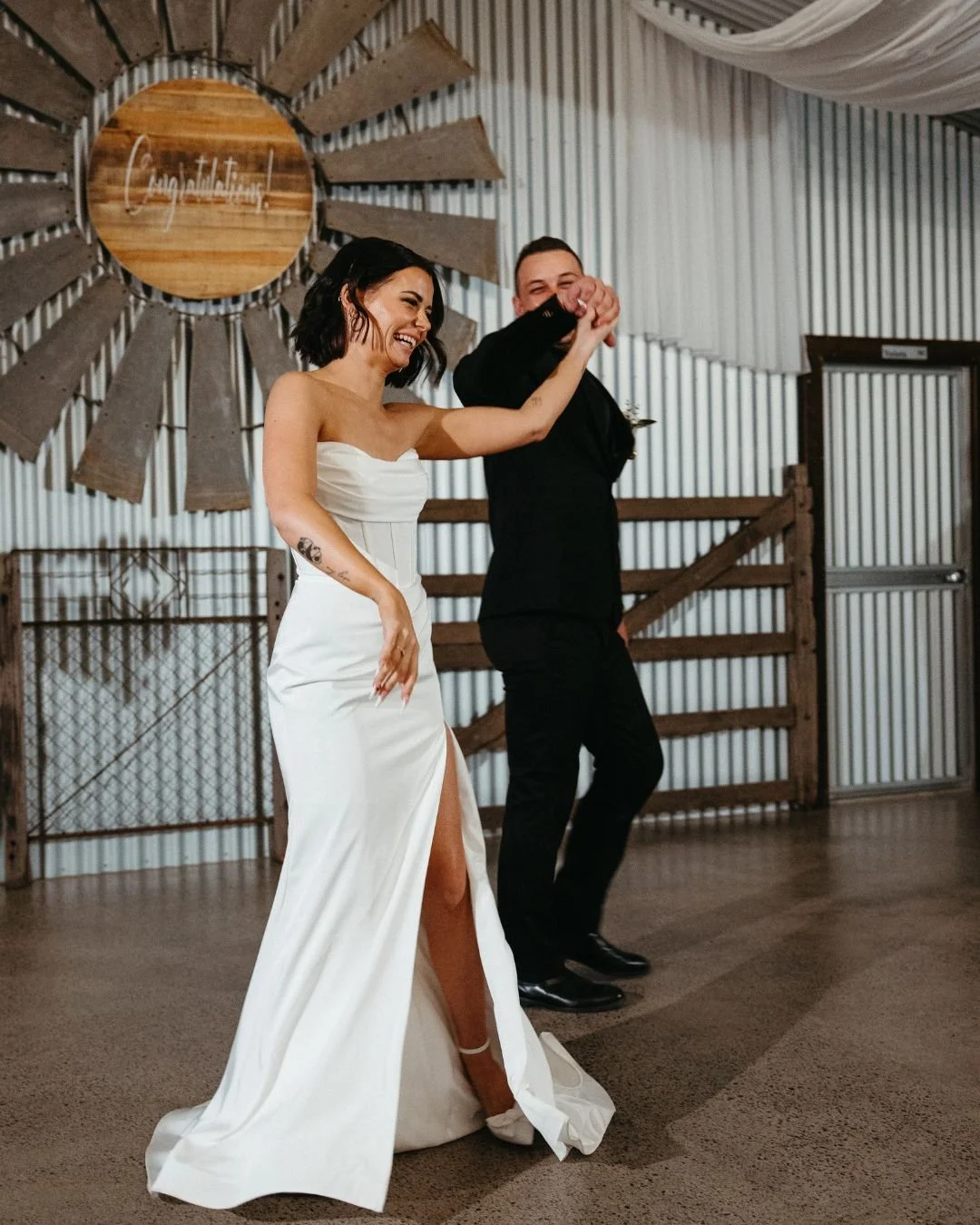 Real bride in a professionally altered wedding gown comfortably dancing in the reception.