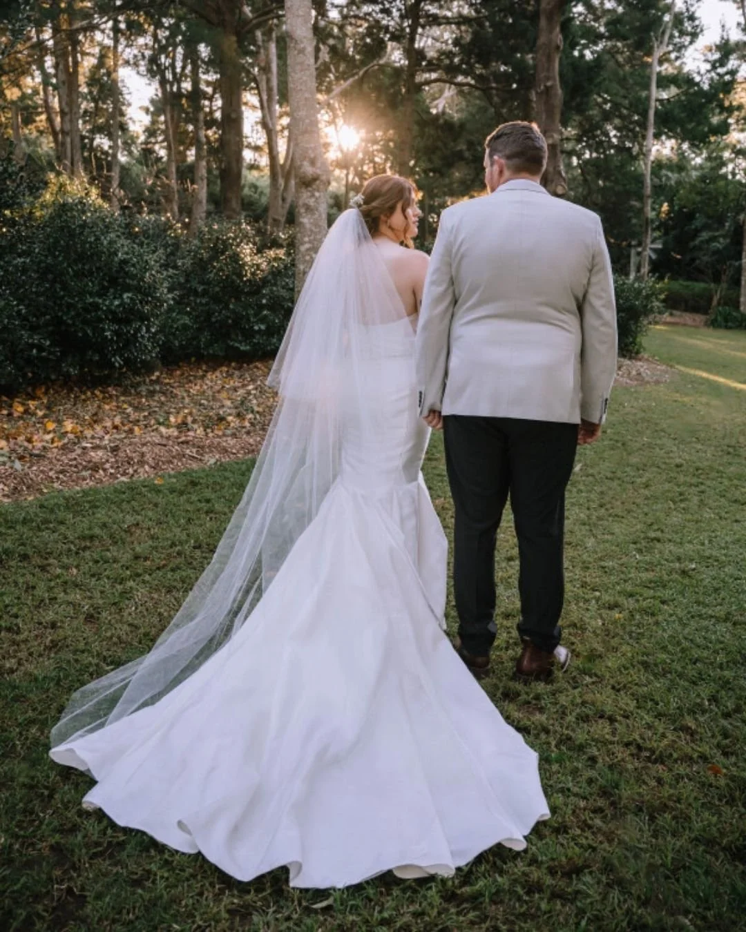 ride wearing chapel veil in outdoor ceremony