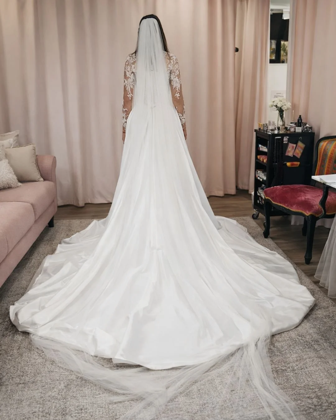 Bride wearing 144" cathedral veil in studio fitting.