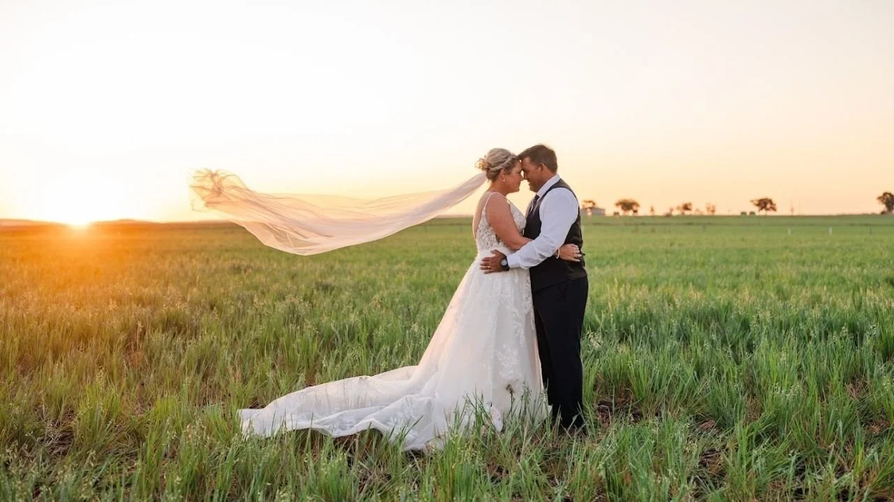 Rebecca Sawyer wearing custom 144" ivory glimmer veil