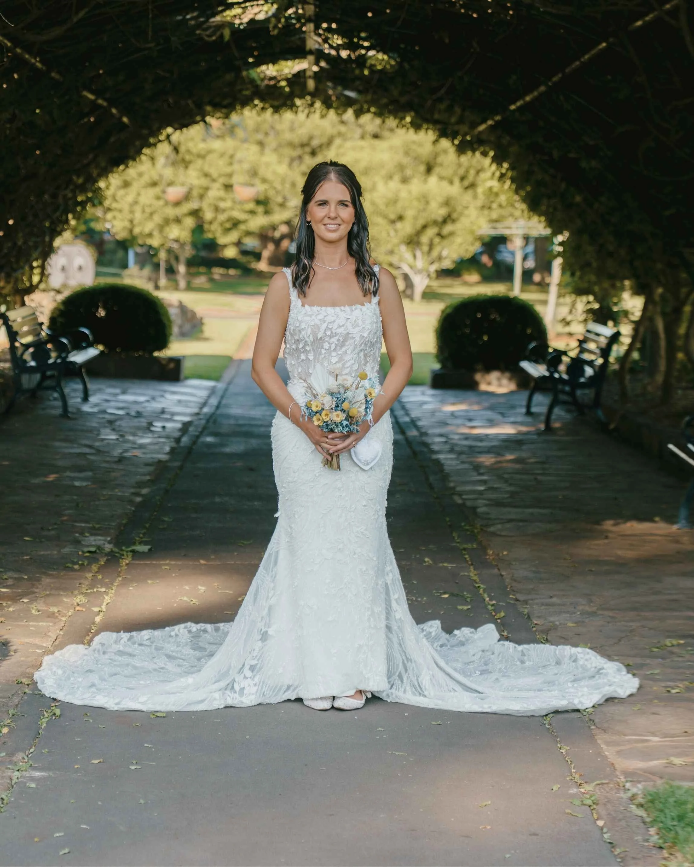 Professional photo of a bride wearing her perfectly fitted wedding dress, altered by Rachel’s Custom Sewing in Toowoomba