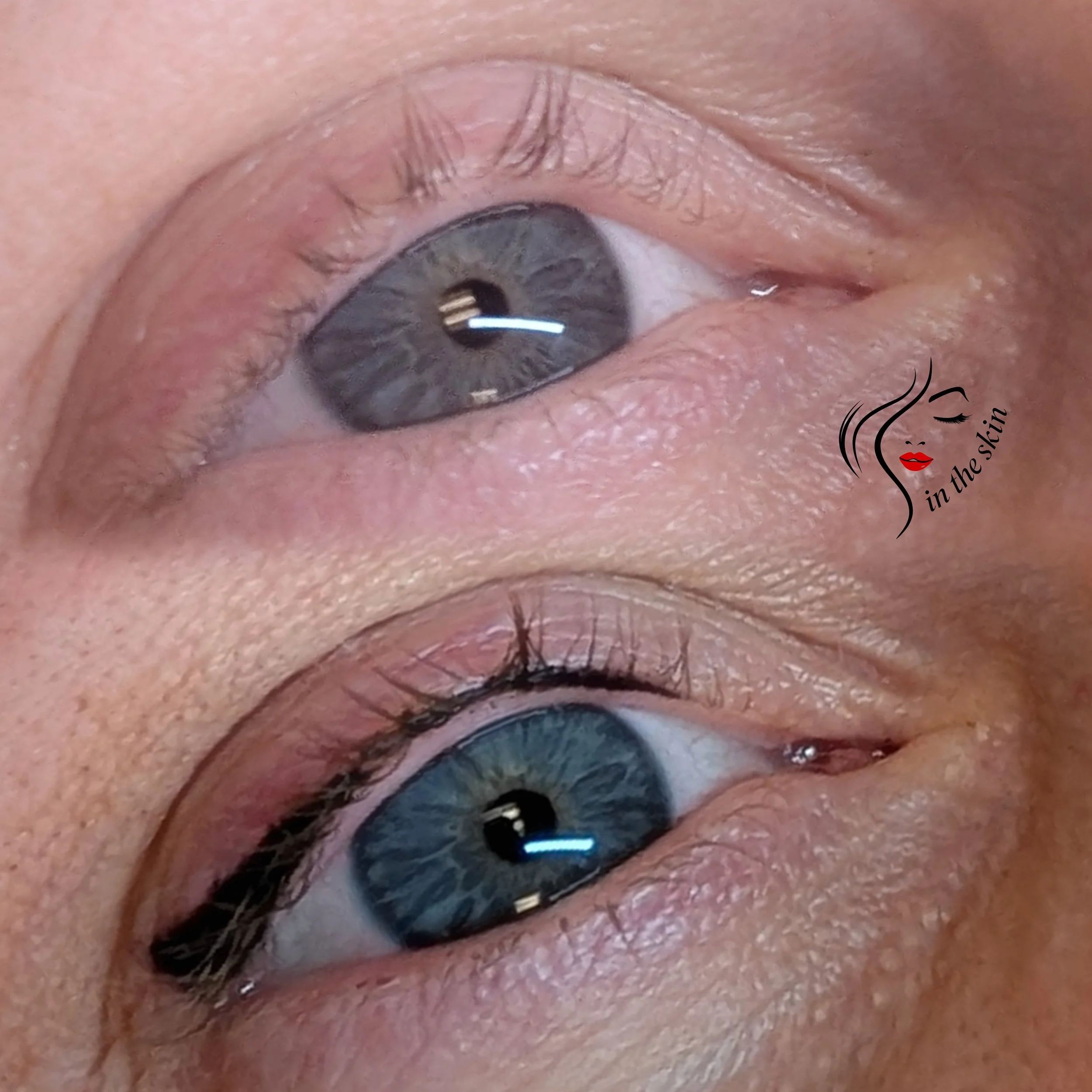 Classic eyeliner tattoo is custom designed to lift down turned eyes on this client