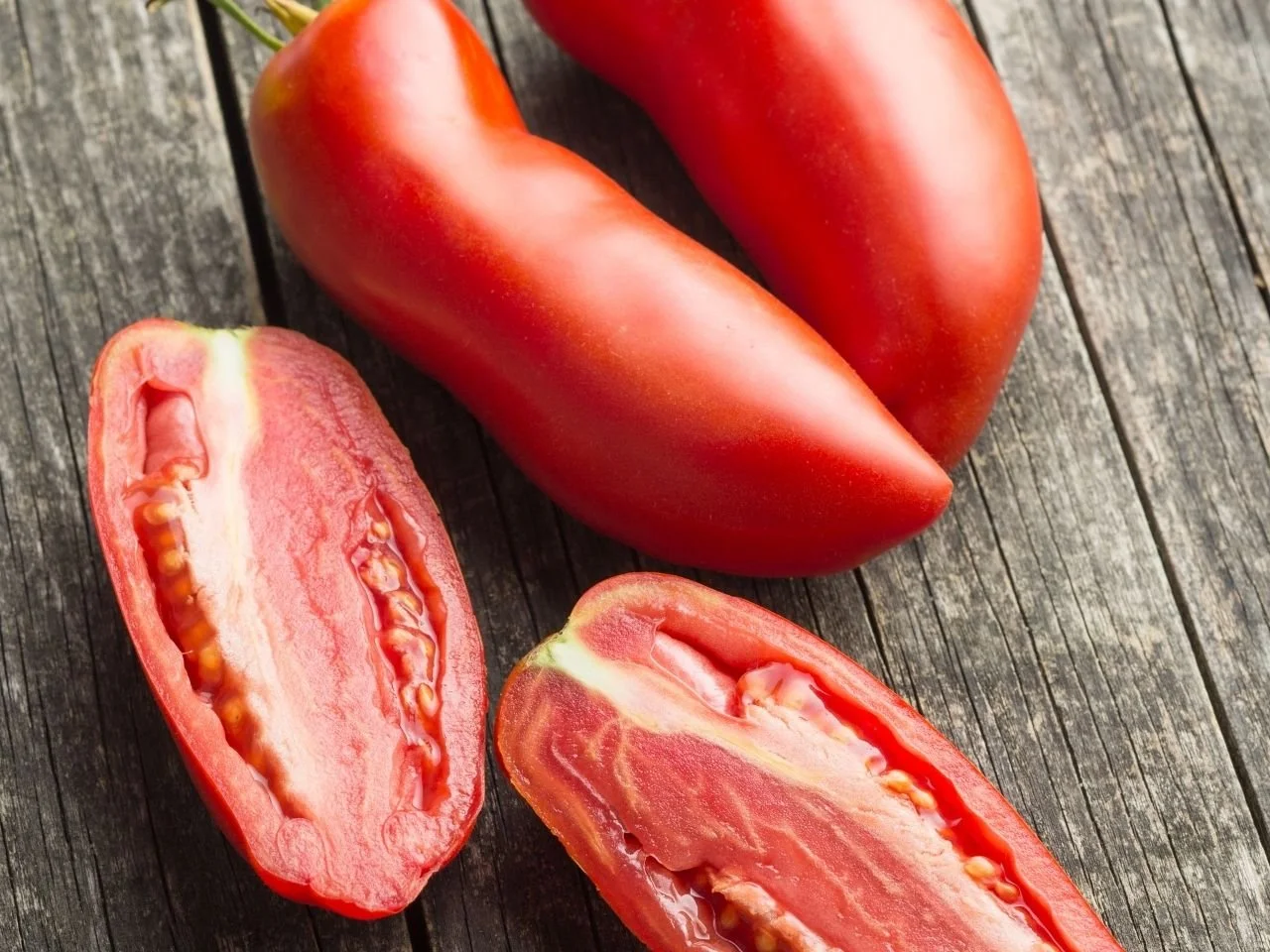 Fresh San Marzano tomatoes with thick flesh for homemade tomato sauce