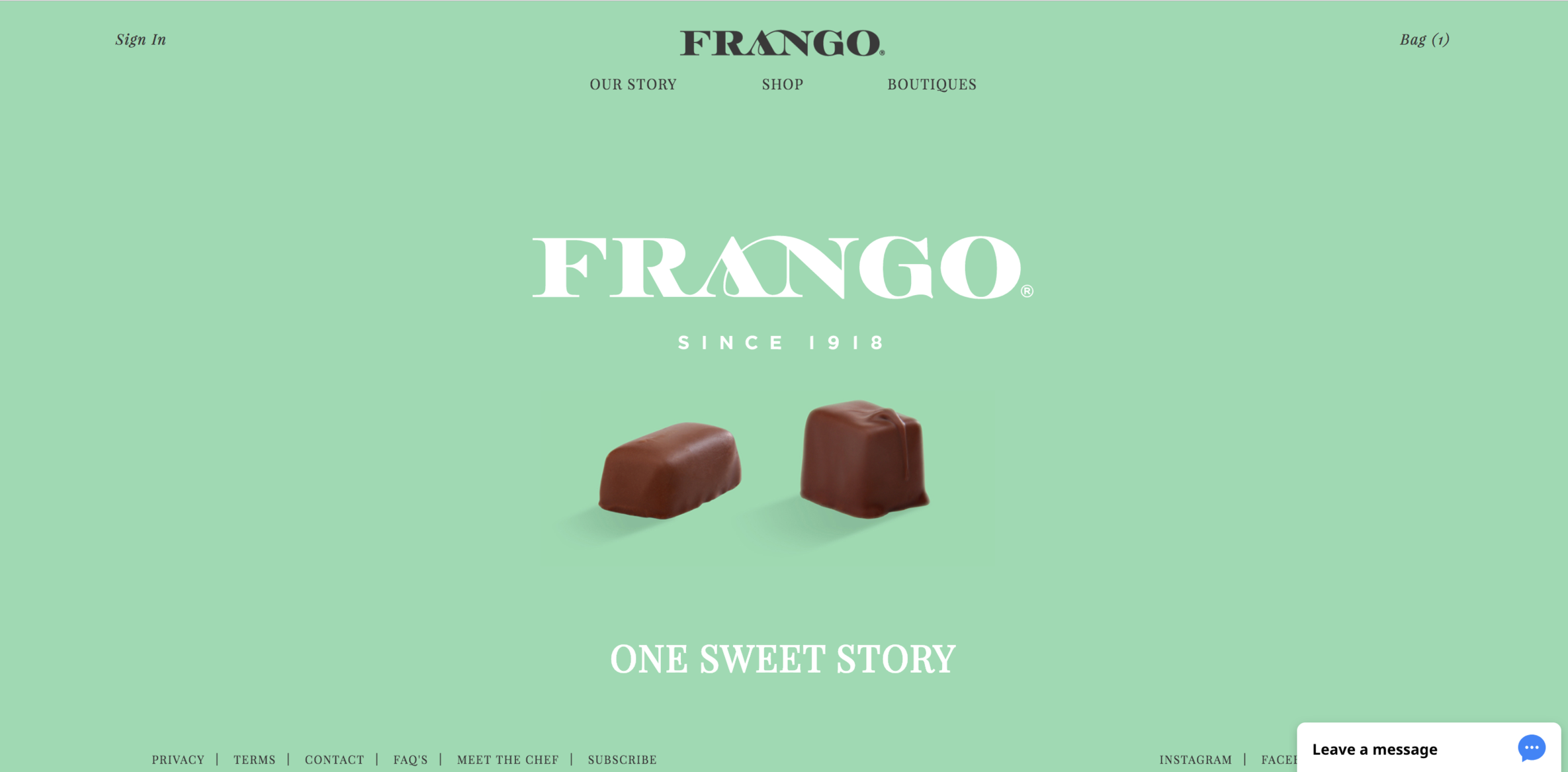 Frango chocolates website homepage featuring two chocolate pieces on a green background with "FRANGO" and "One Sweet Story" text.
