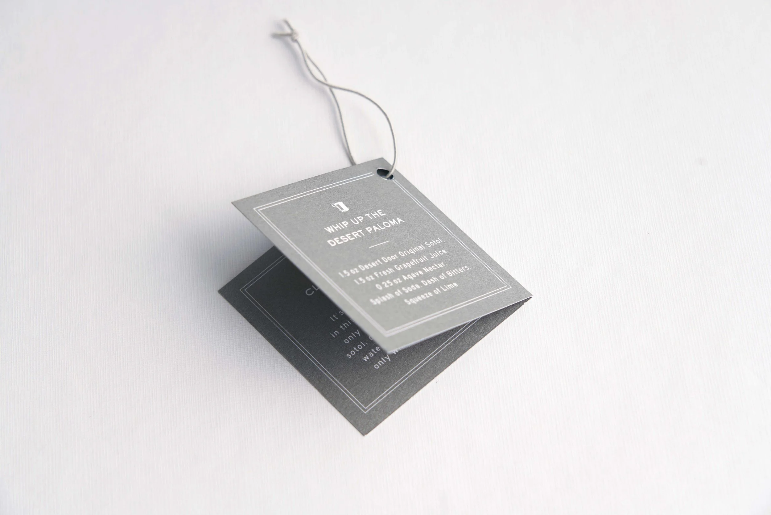 French Fox Design: Desert Door Texas Sotol, Print Design: Bottle Hang Tag in Metallic Silver Ink