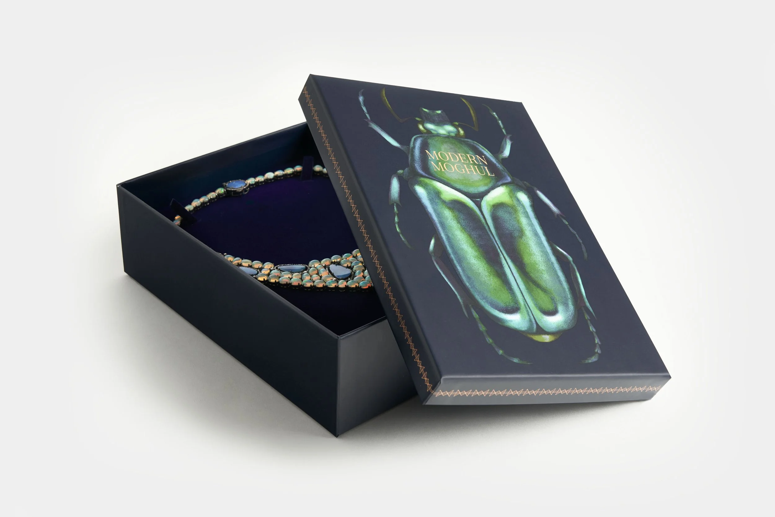 French Fox Design: Modern Moghul Jewelry Box Featuring a Necklace & Scarab Beetle Illustration