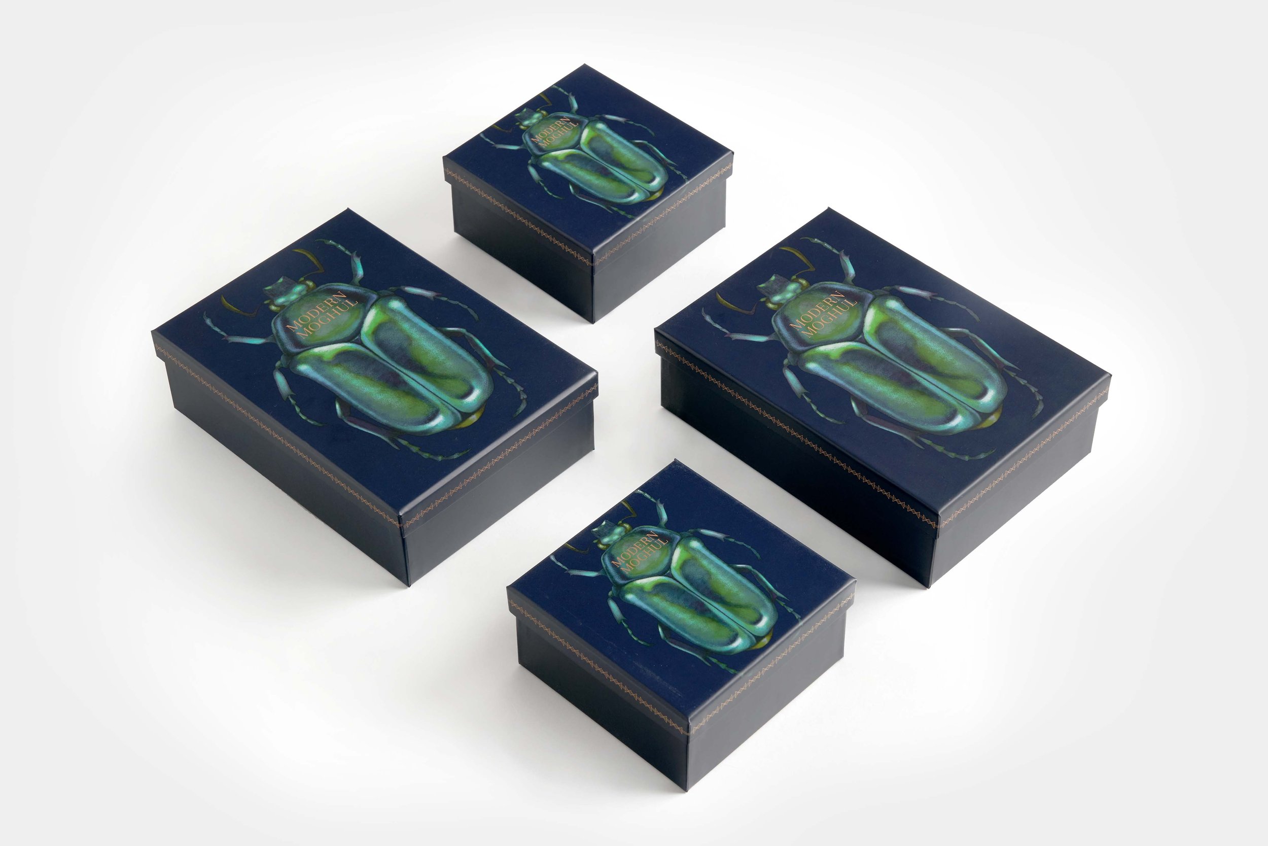 French Fox Design: Modern Moghul Jewelry Boxes Featuring a Scarab Beetle Illustration