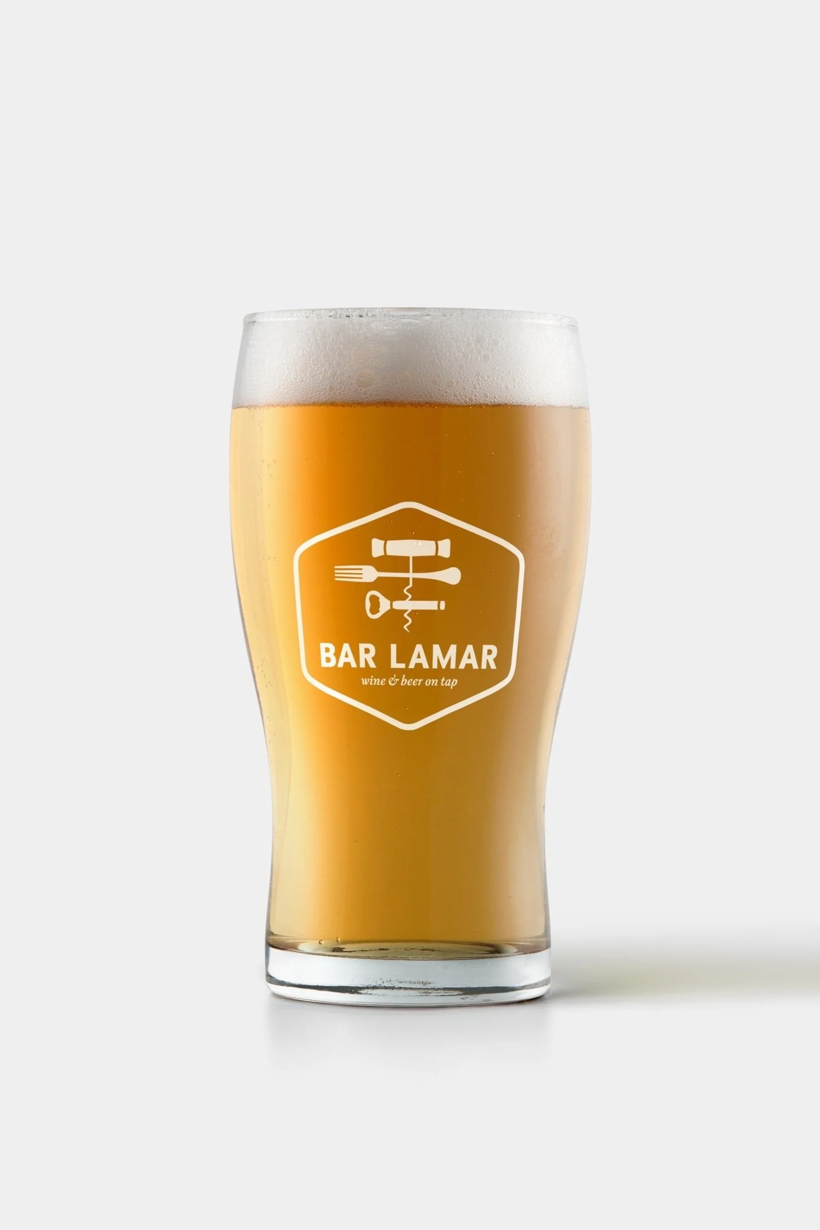 French Fox Design: Whole Foods Market, Bar Lamar Wine & Beer Taproom Identity Logo Appearing on Beer Pint Glass