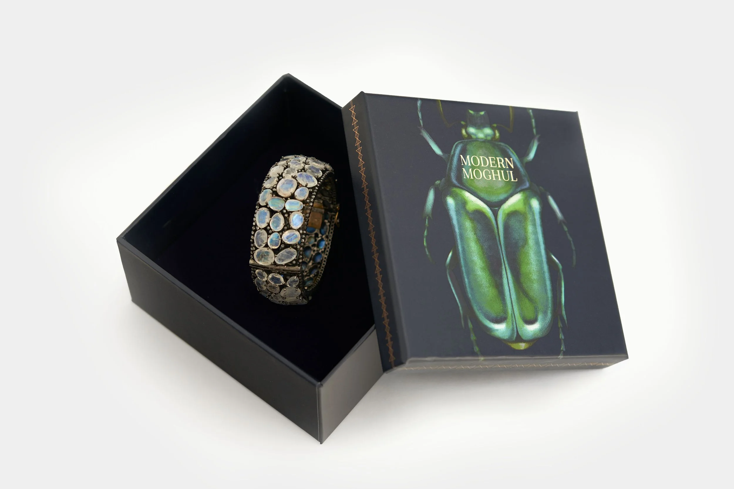 French Fox Design: Modern Moghul Jewelry Box Featuring a Bracelet & Scarab Beetle Illustration