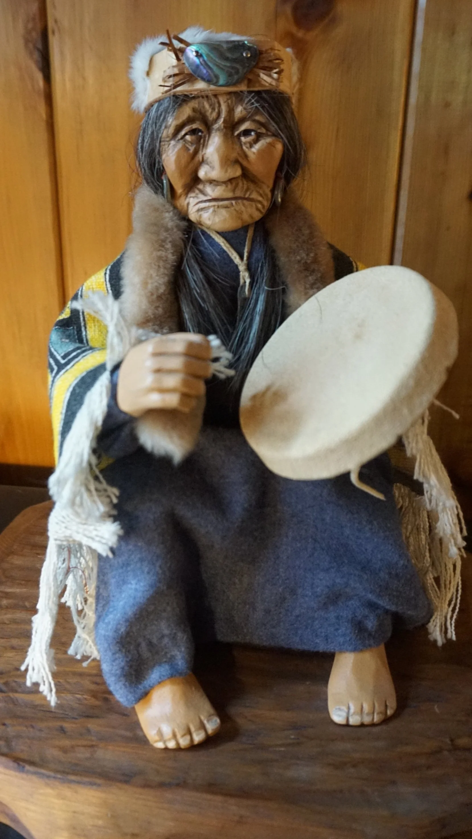 Tsimshian elder with hand drum.  Carved by Shona Hah (1978)