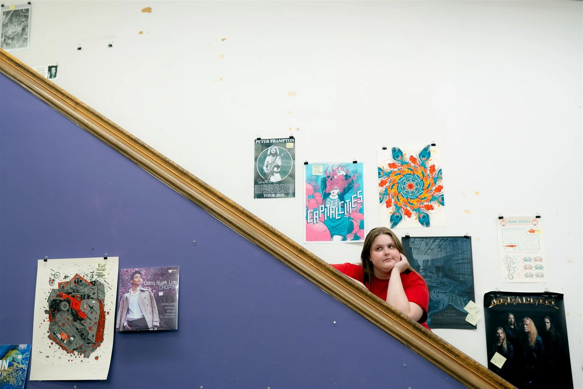 Creative portrait of photographer on staircase