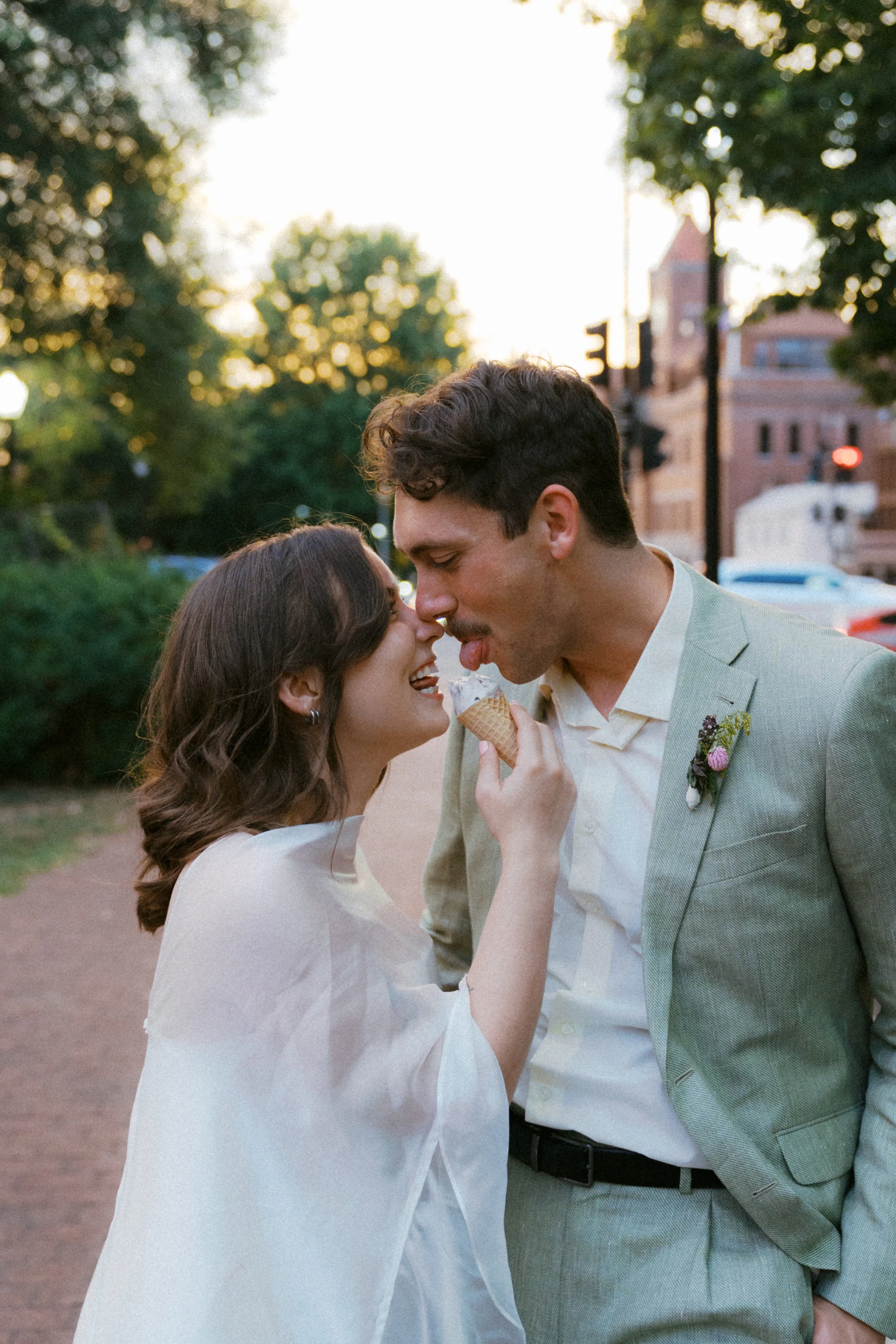  couple eating ice cream after washington dc elopement at sunset 