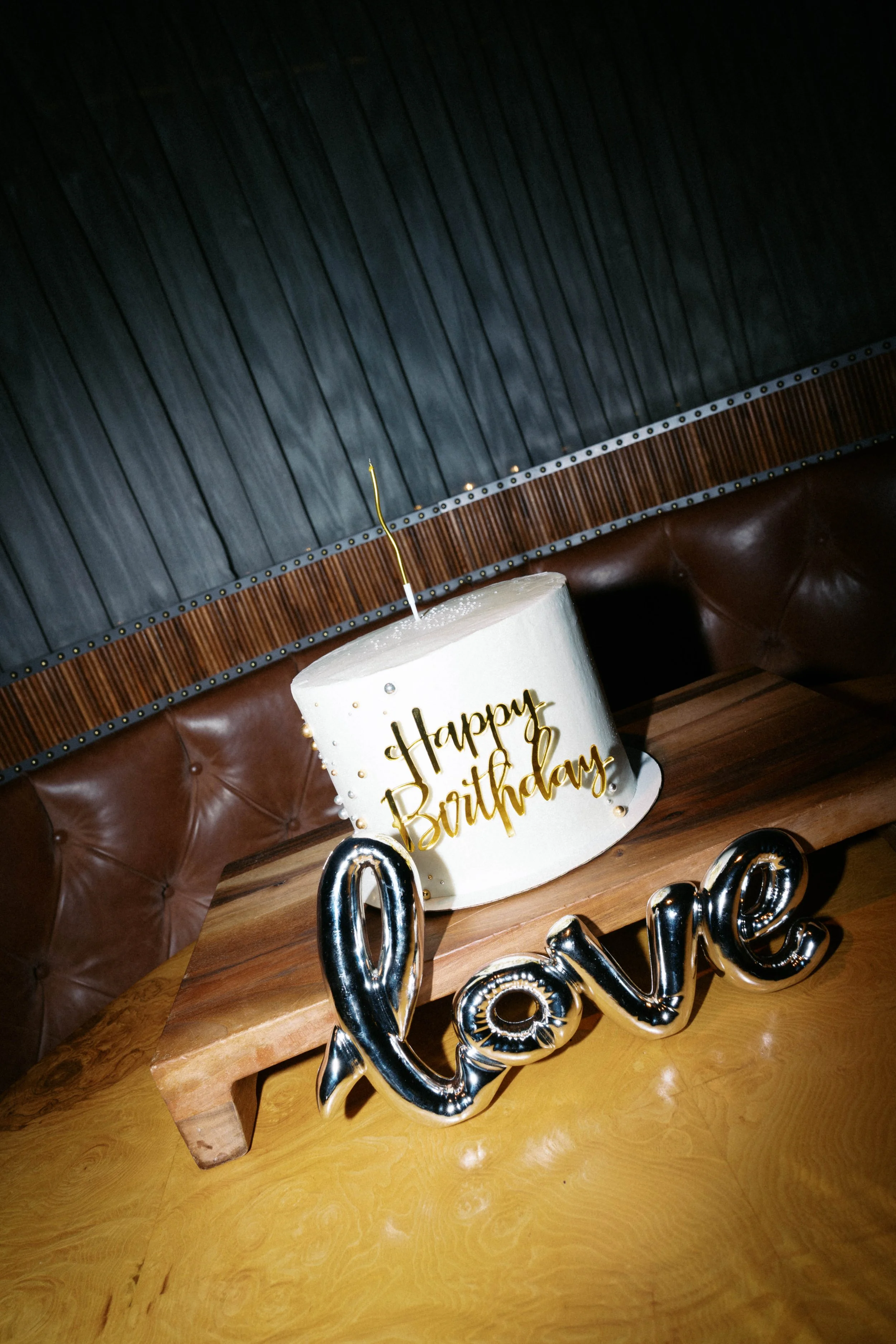 33rd birthday cake at Catbird in Dallas Texasbirthday cake with “love” balloons at Catbird Dallas celebration