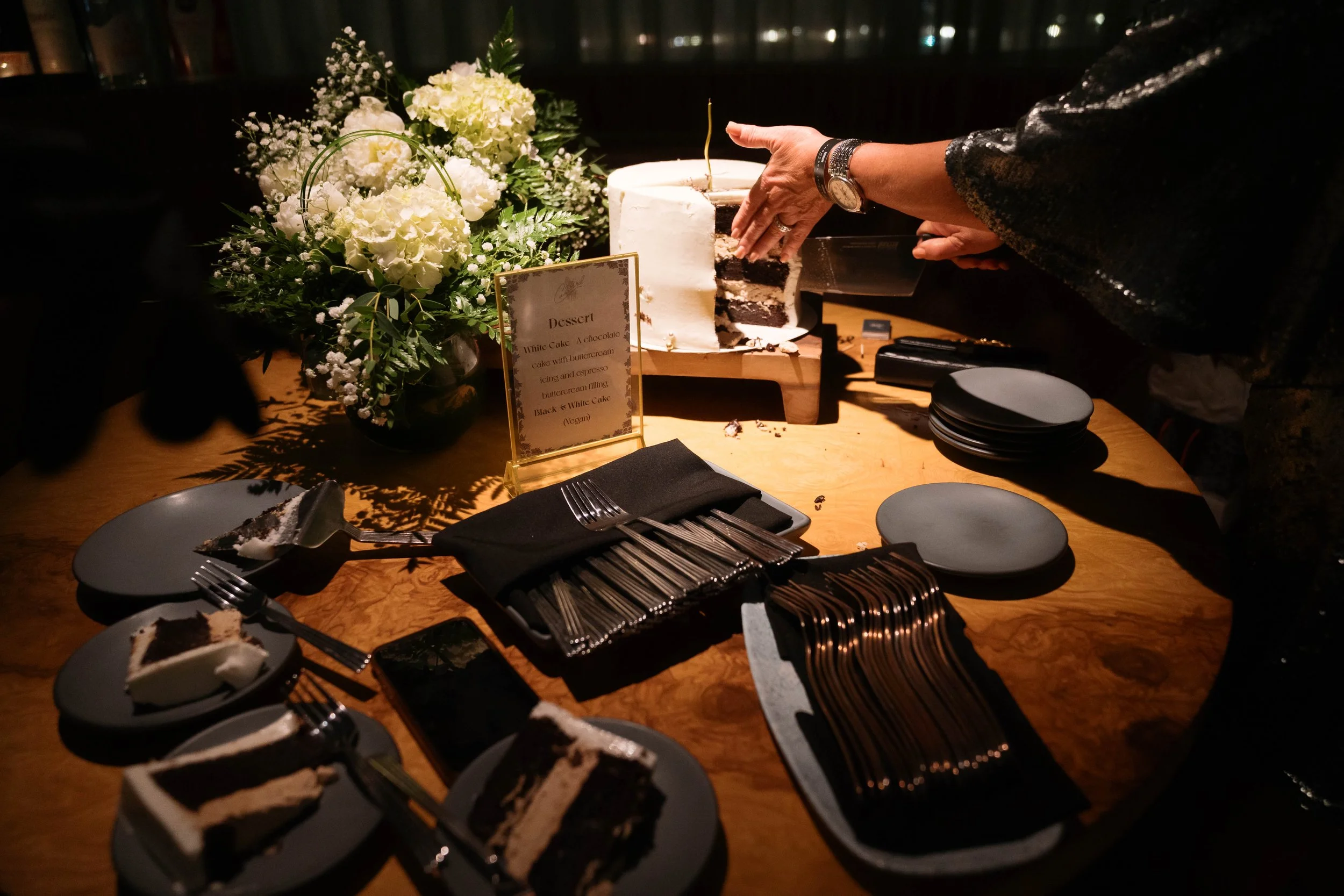 dessert table and cake slices at Catbird Dallas birthday party