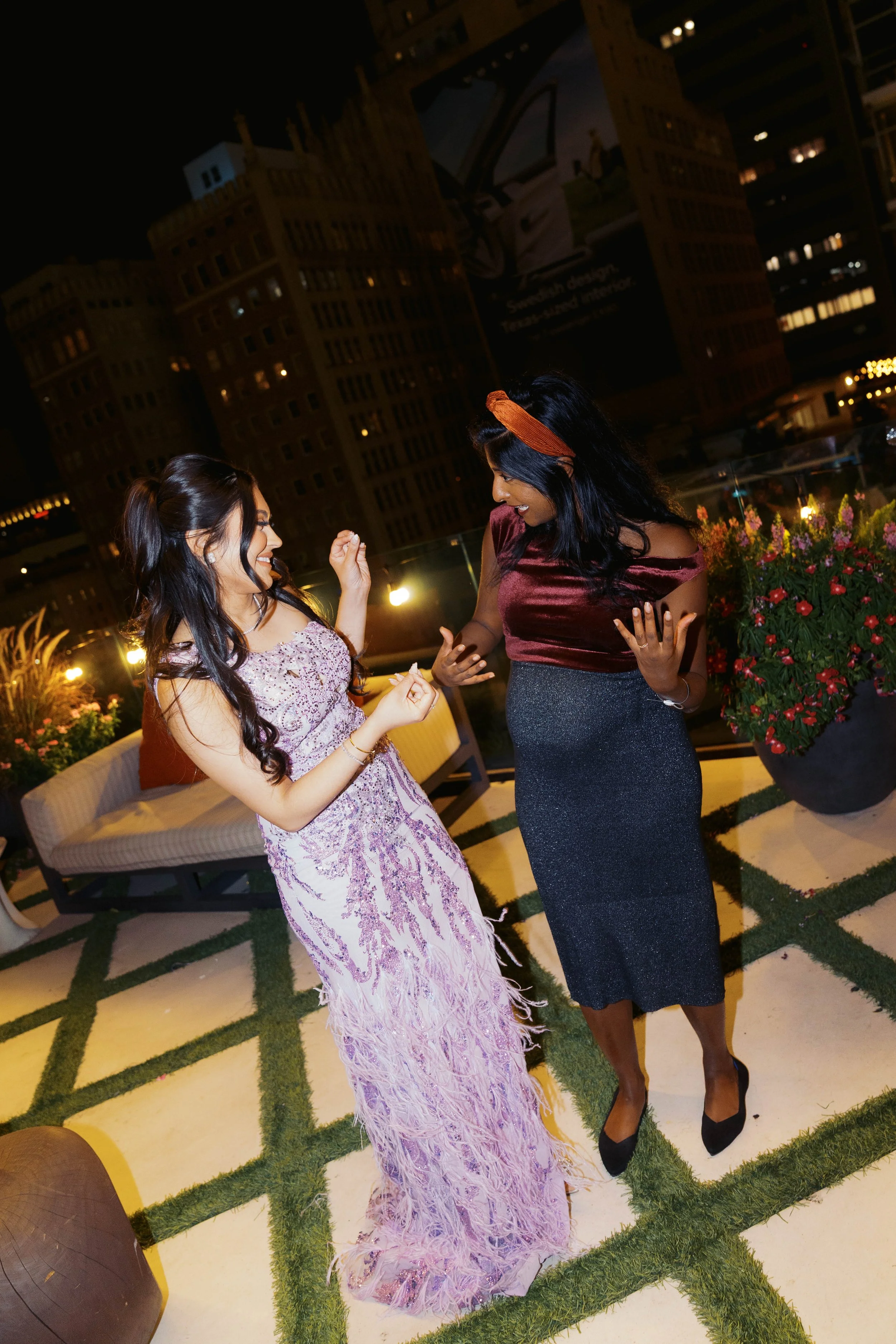friends dancing on rooftop terrace at Catbird Dallas Dallas birthday party