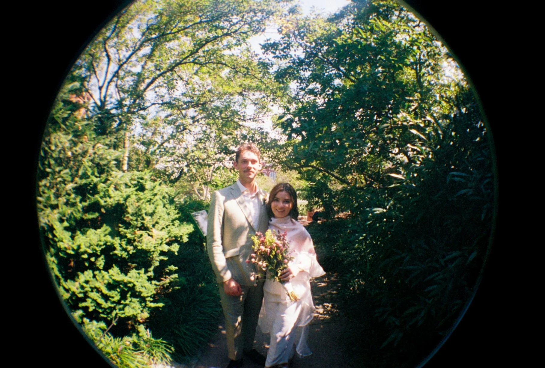 fisheye film photograph of couple in Smithsonian Gardens Washington DC elopement