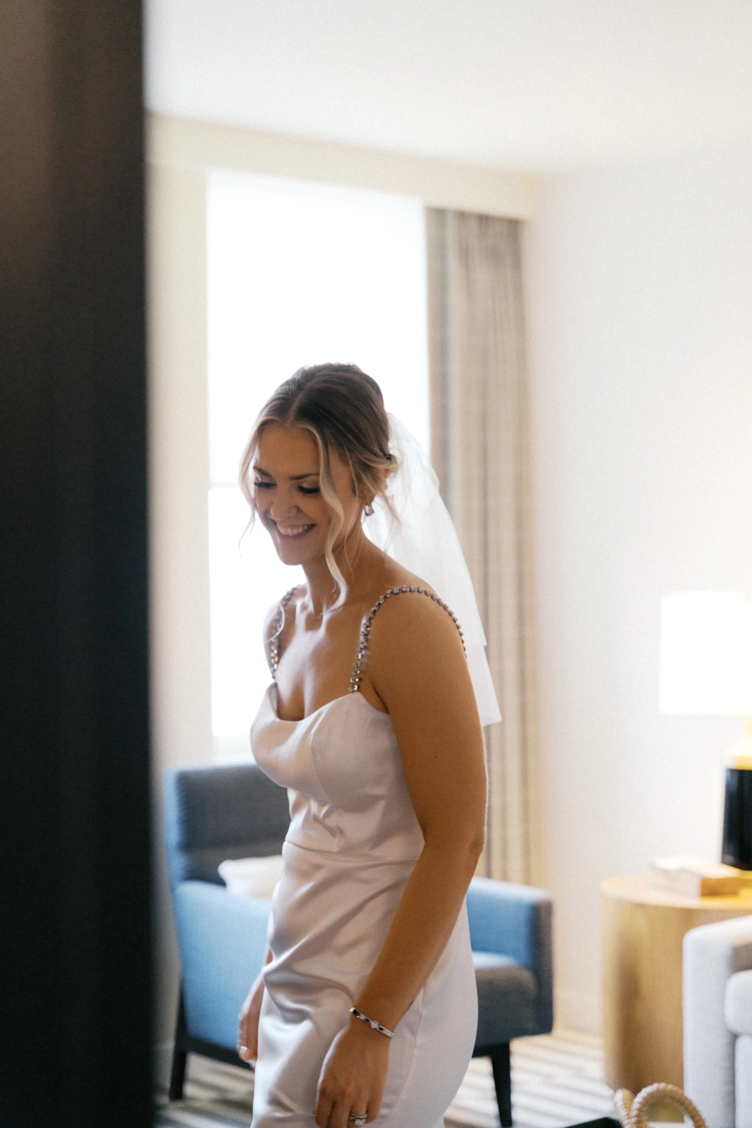 Couple sharing quiet moment near window at Kimpton Harper Hotel