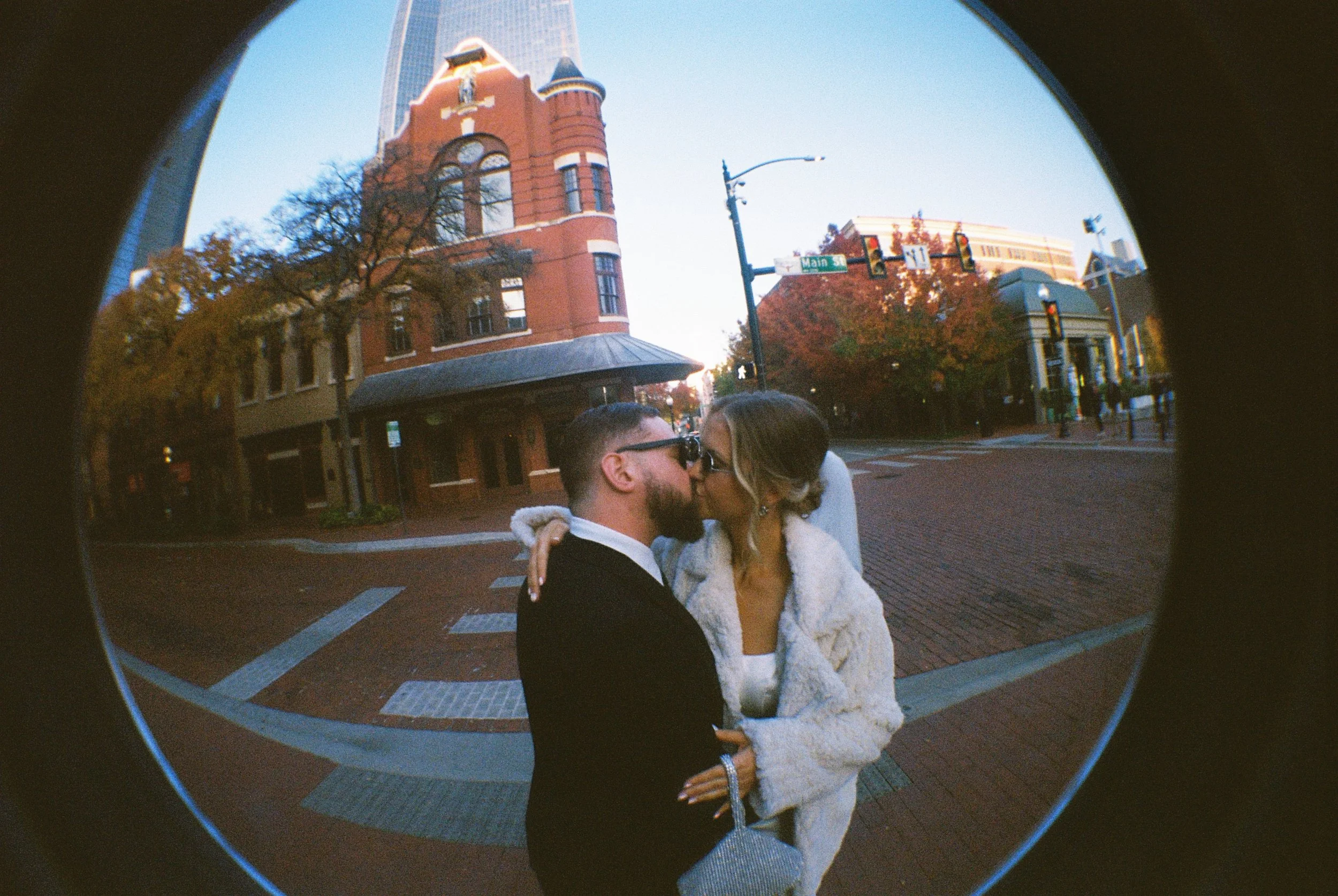 Fisheye wedding portraits on film in Sundance Square Fort Worth