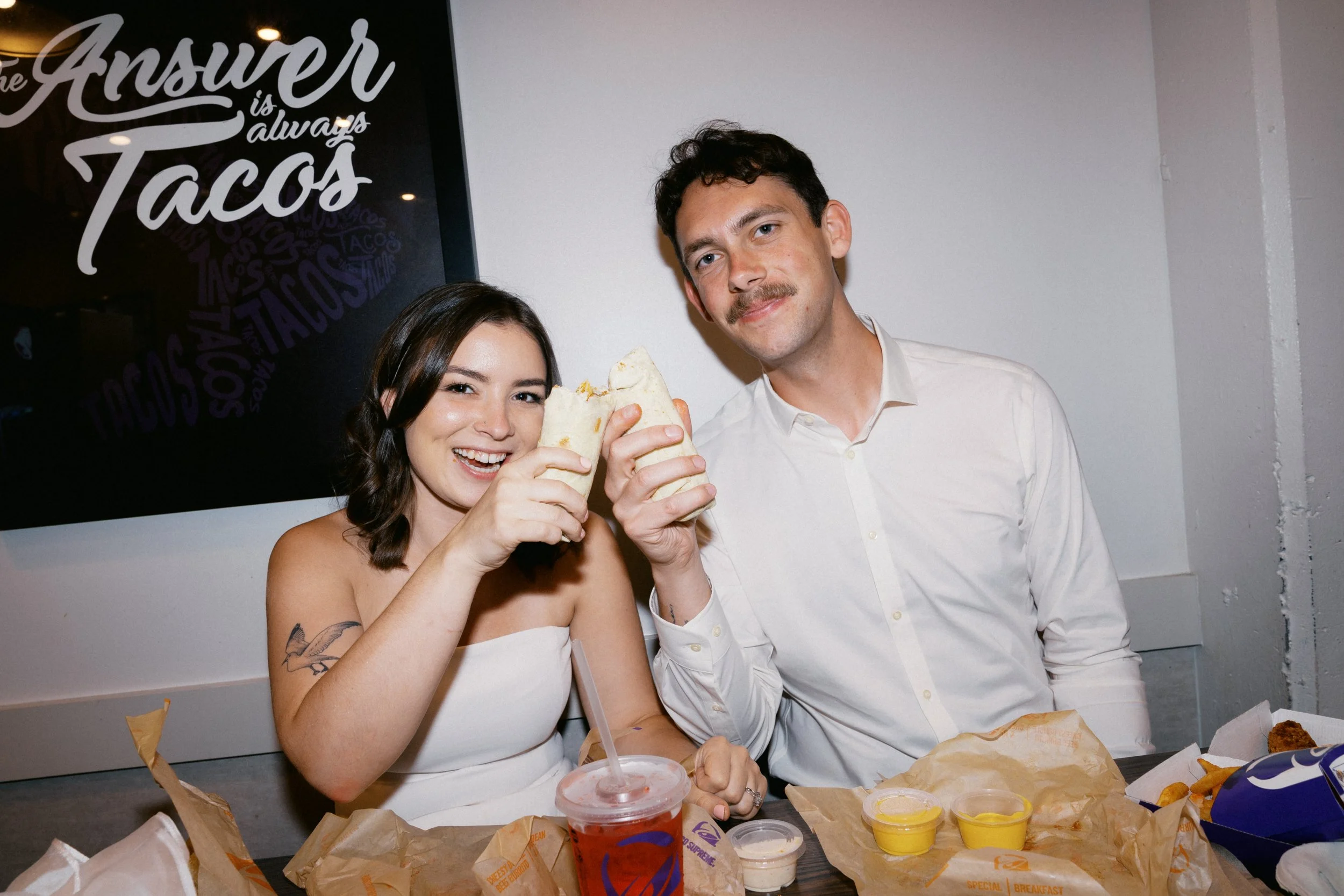 fun candid wedding photo at Taco Bell after Washington DC courthouse elopement