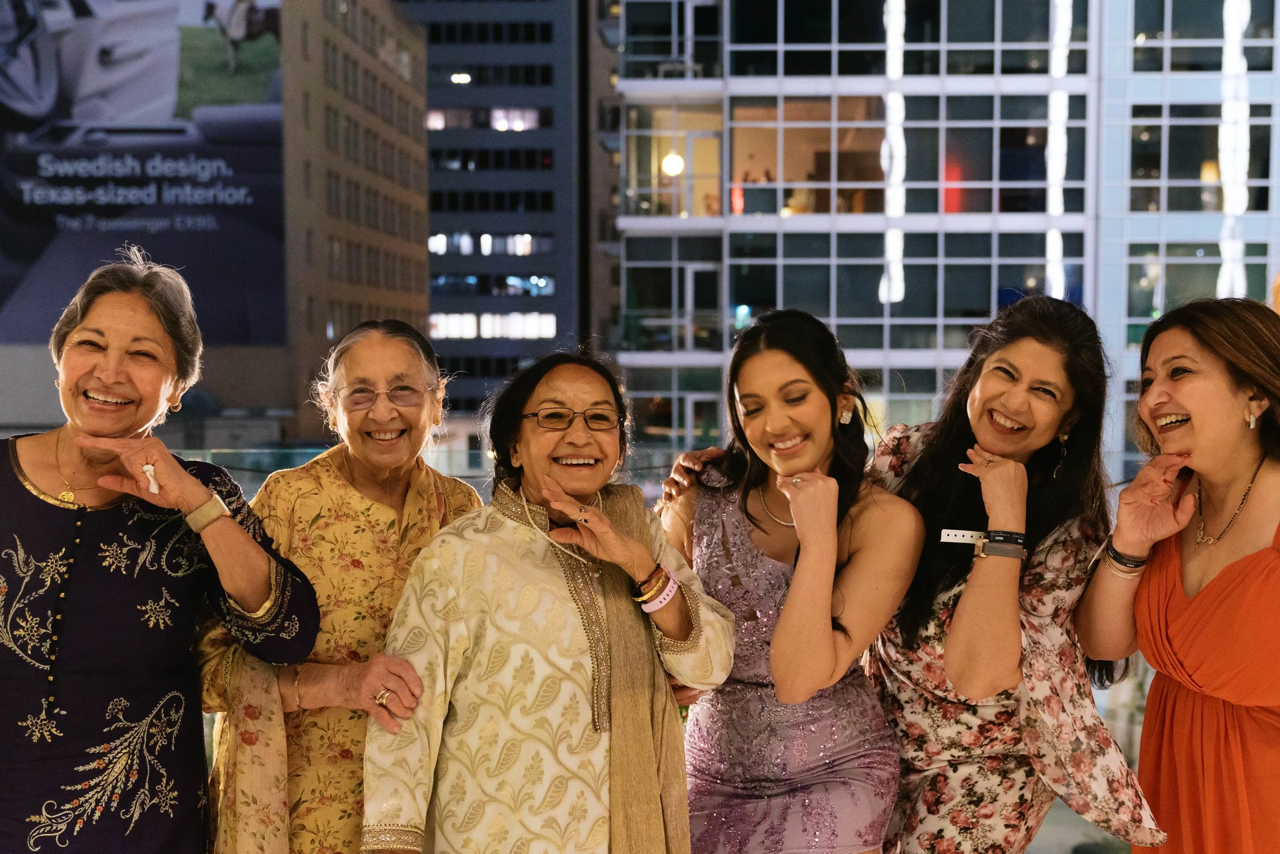 rooftop family portrait at Catbird Dallas at night