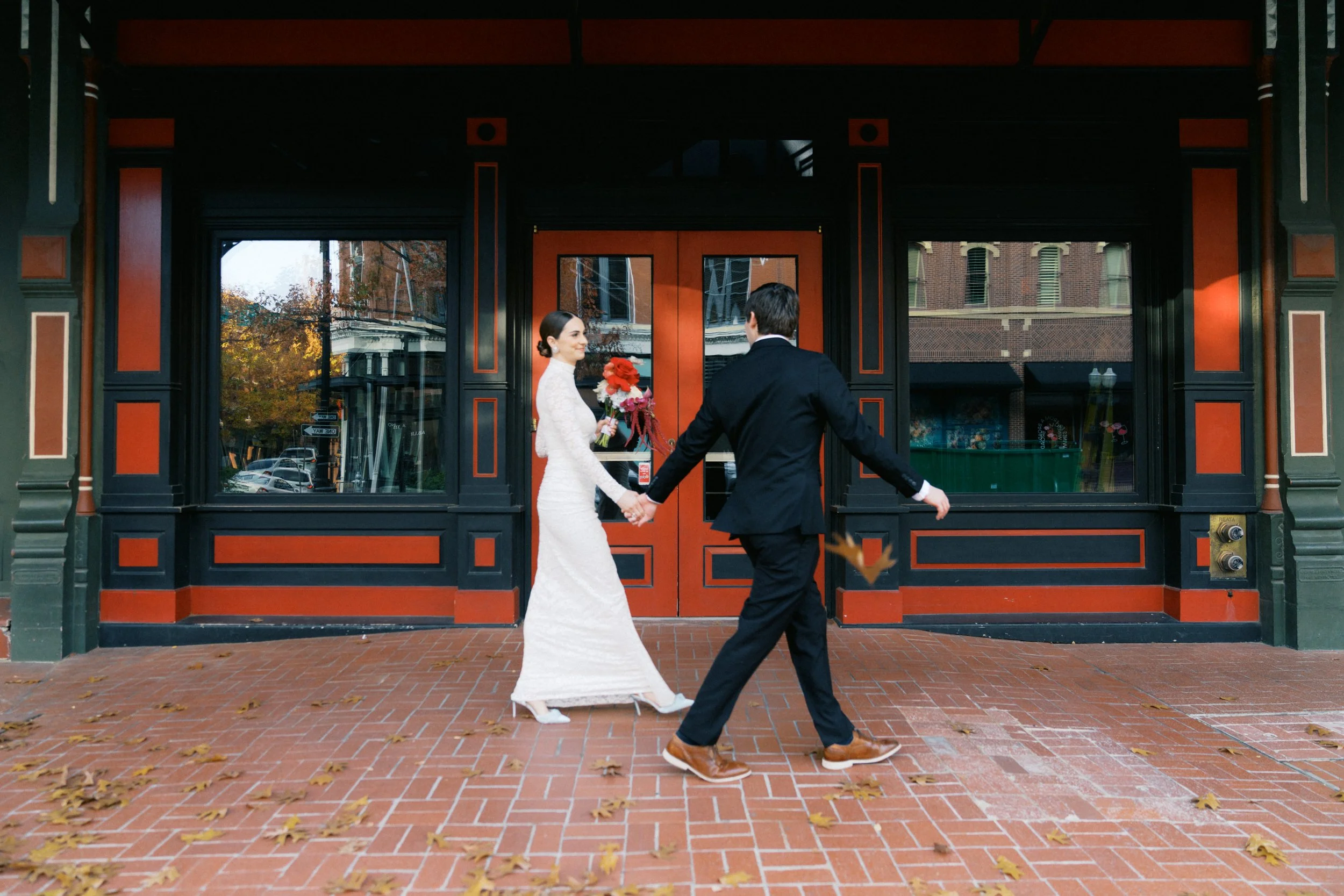 couple walking in Sundance Square Fort Worth after intimate wedding ceremony