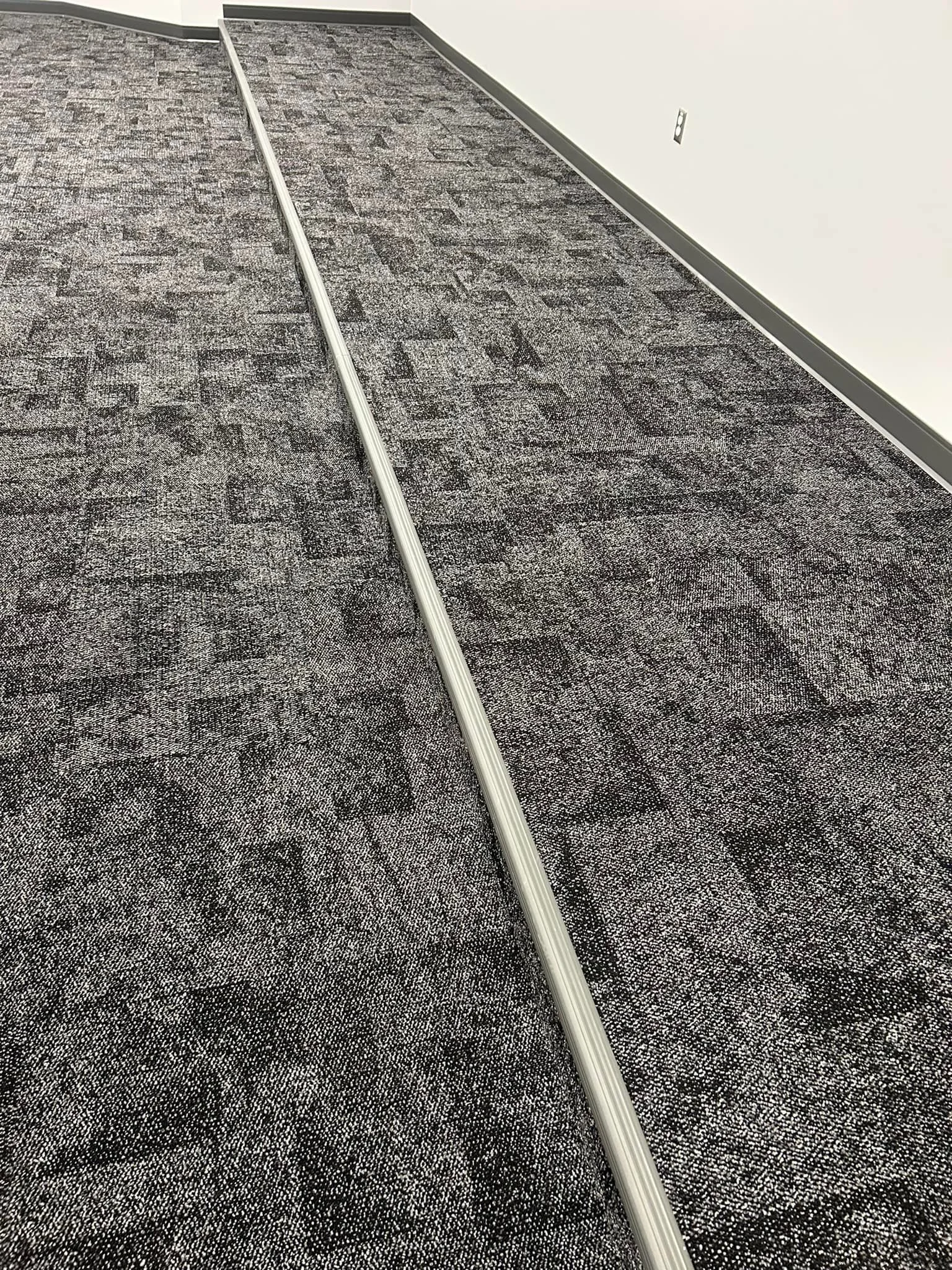 Interface - Open Air 404 - Black 106745
Tarkett Official - Recess Profile 20 Charcoal RB + VCD-20 Stair nosing
