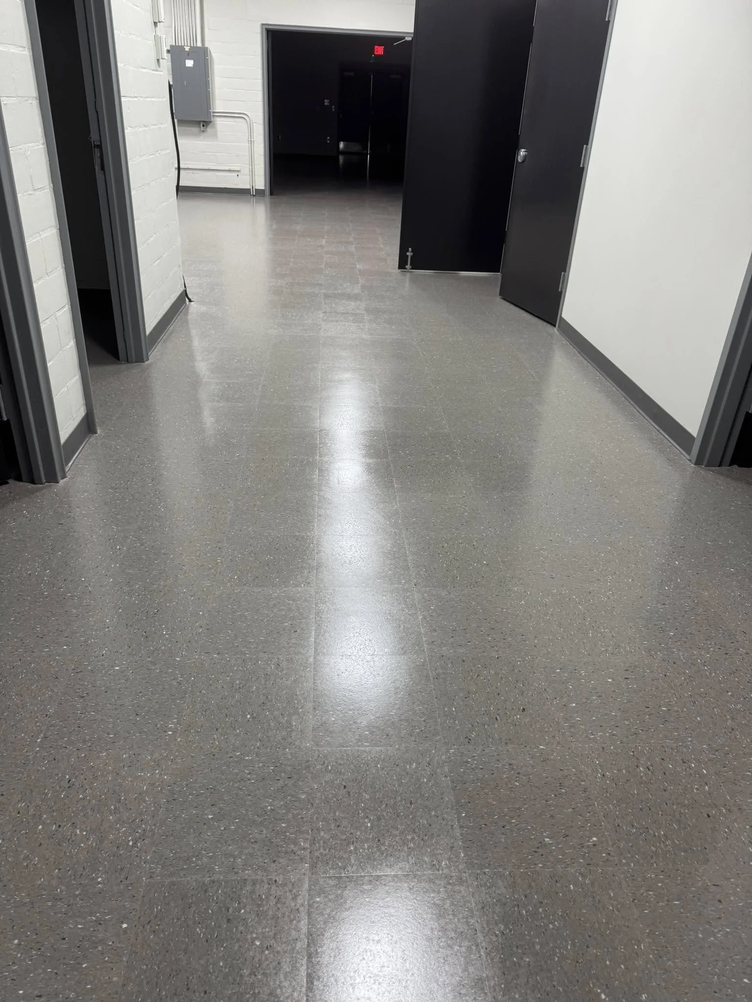 12,600 sqft - AHF Products - Iliad - Falcon Gray
2,640 LF - Roppe Corporation - 700 Series - 123 Charcoal
Floors prepped with HPS Schönox ZM self-leveler in areas, SL in others. Tile waxed with Betco - Hard As Nails floor polish. 