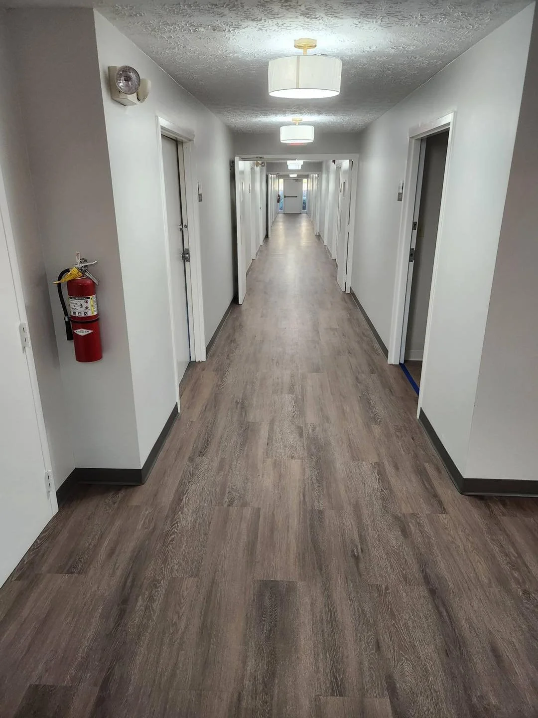 5,300 sqft - Interface - Level Set - A00416 Antique Dark Oak. Marcos and crew knocked this out in only 4 days!