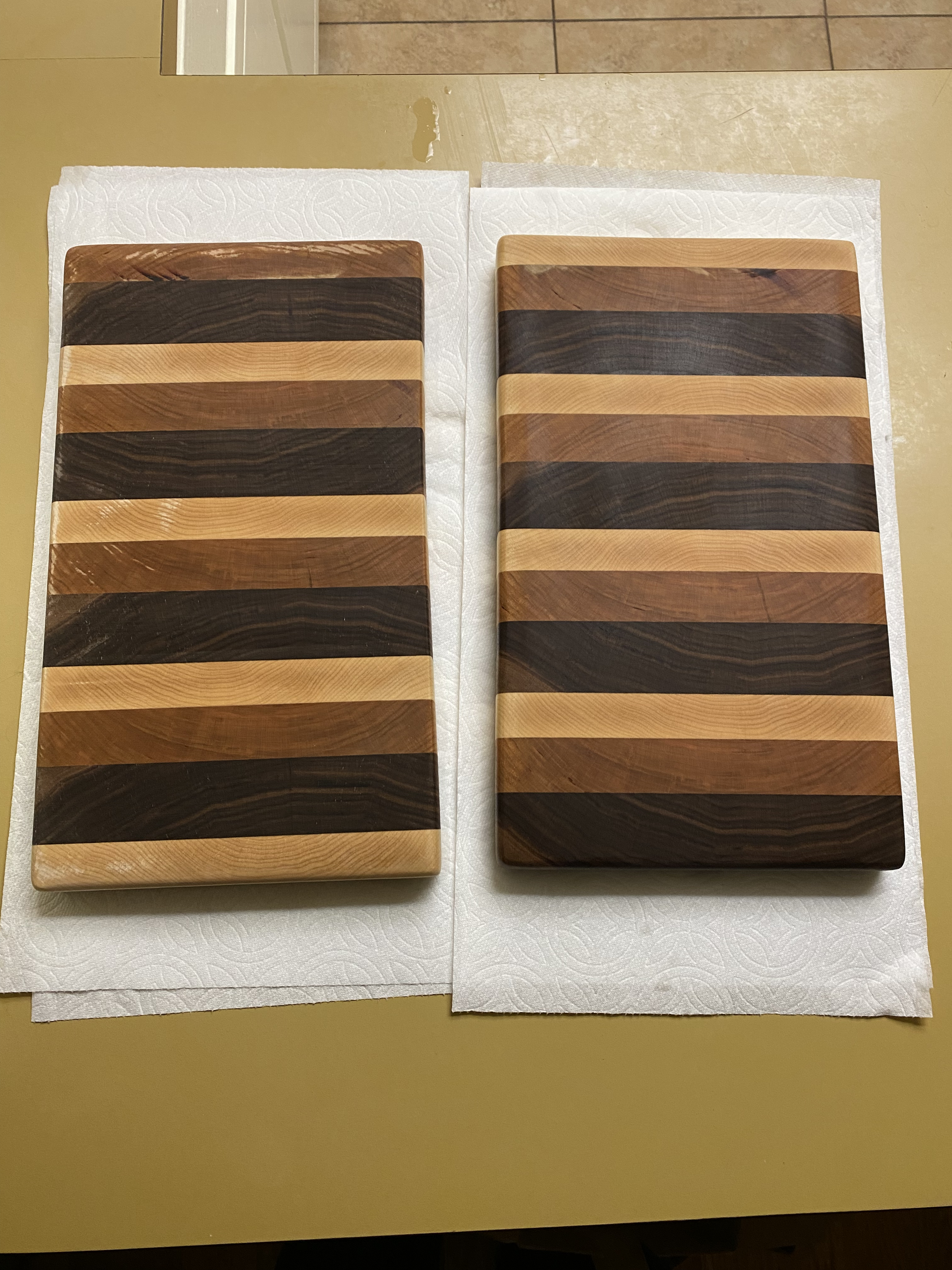 Two striped wooden cutting boards