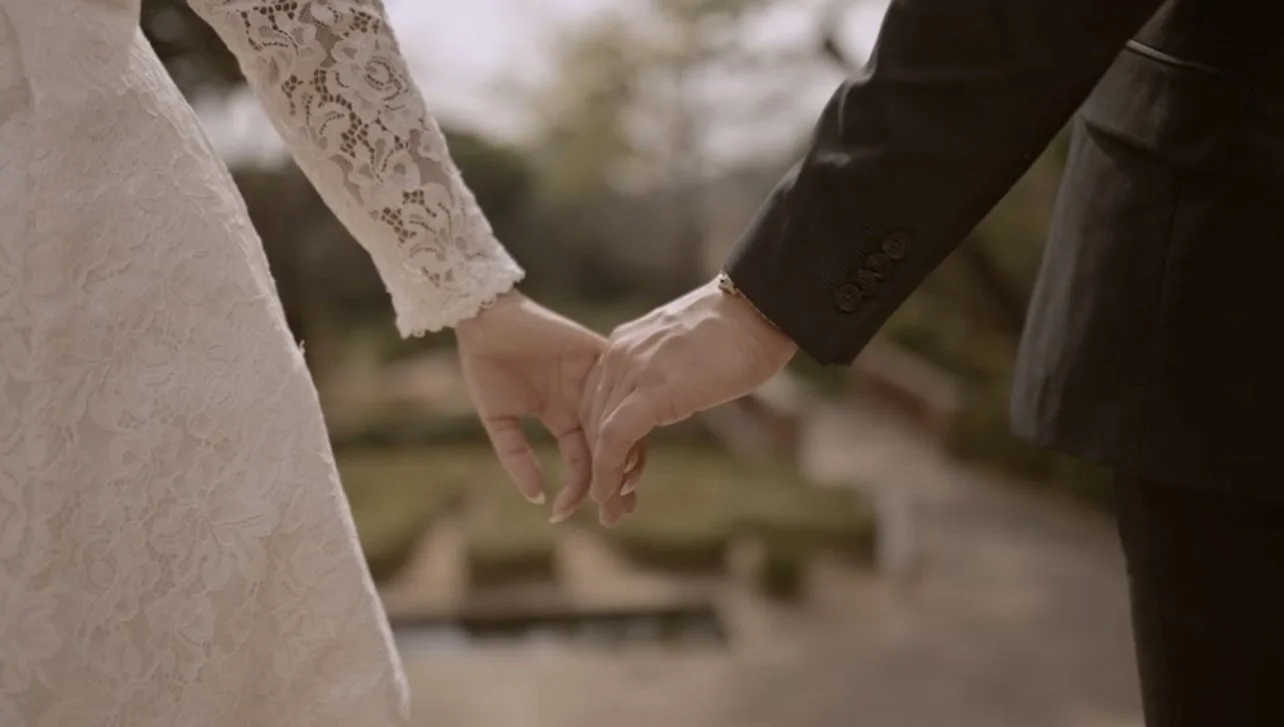 Holding Hands Engagement Still.jpg