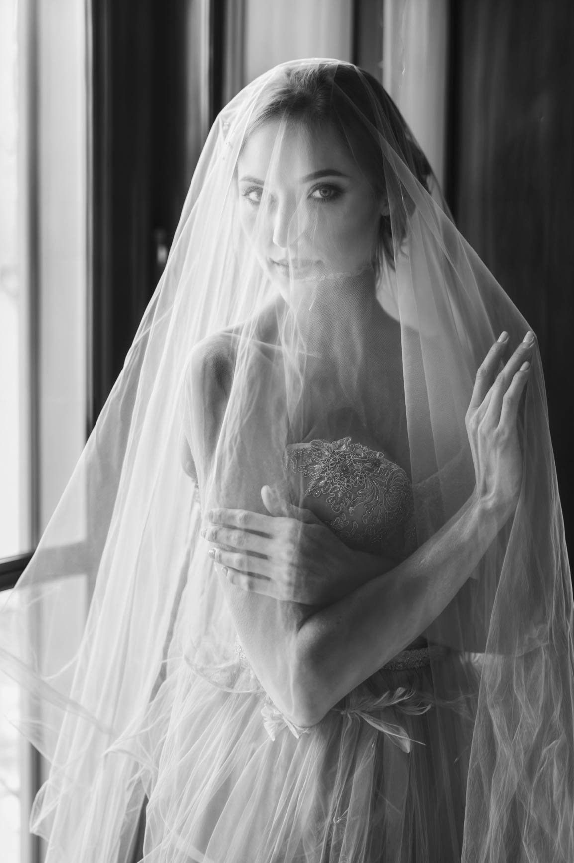 veiled-bride-stands-wall-ancient-villa-enhanced-Edit.jpg