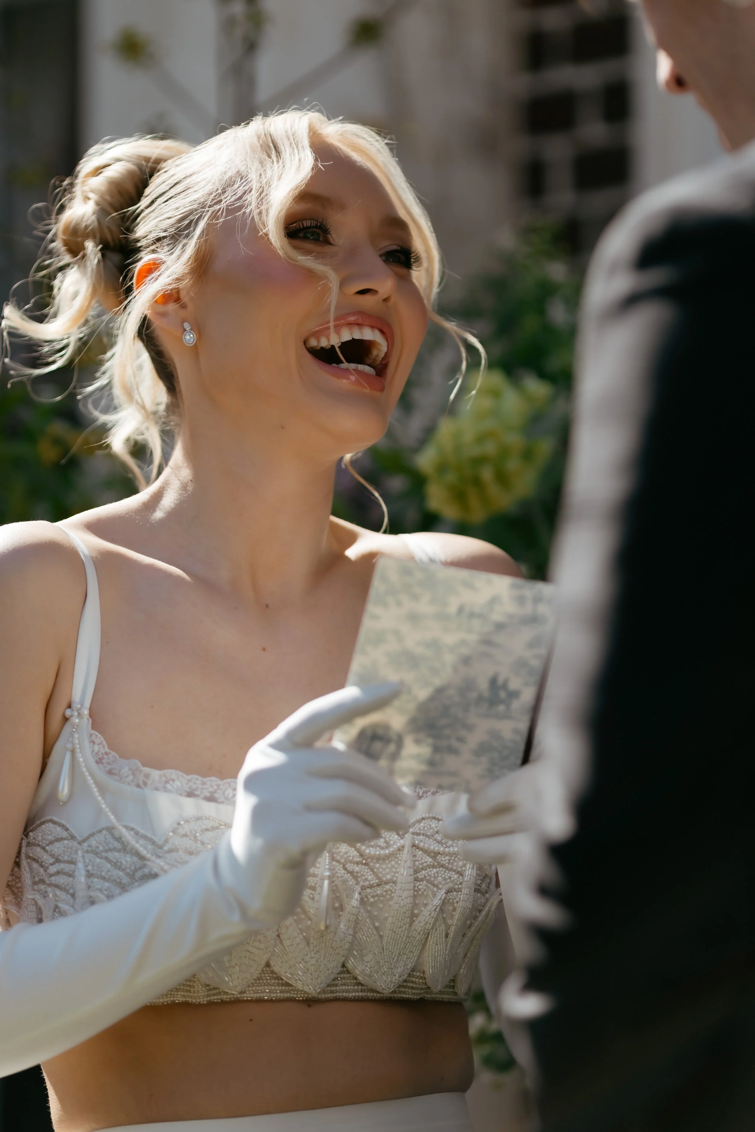 bride reading from her vow book