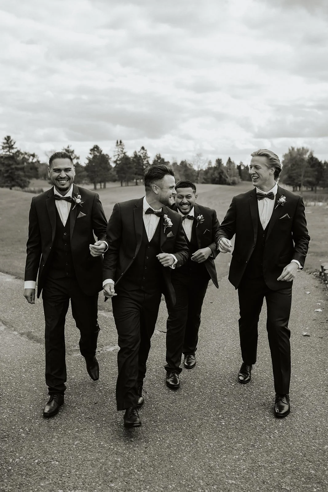 Groomsmen portrait in black and white at outdoor fall wedding