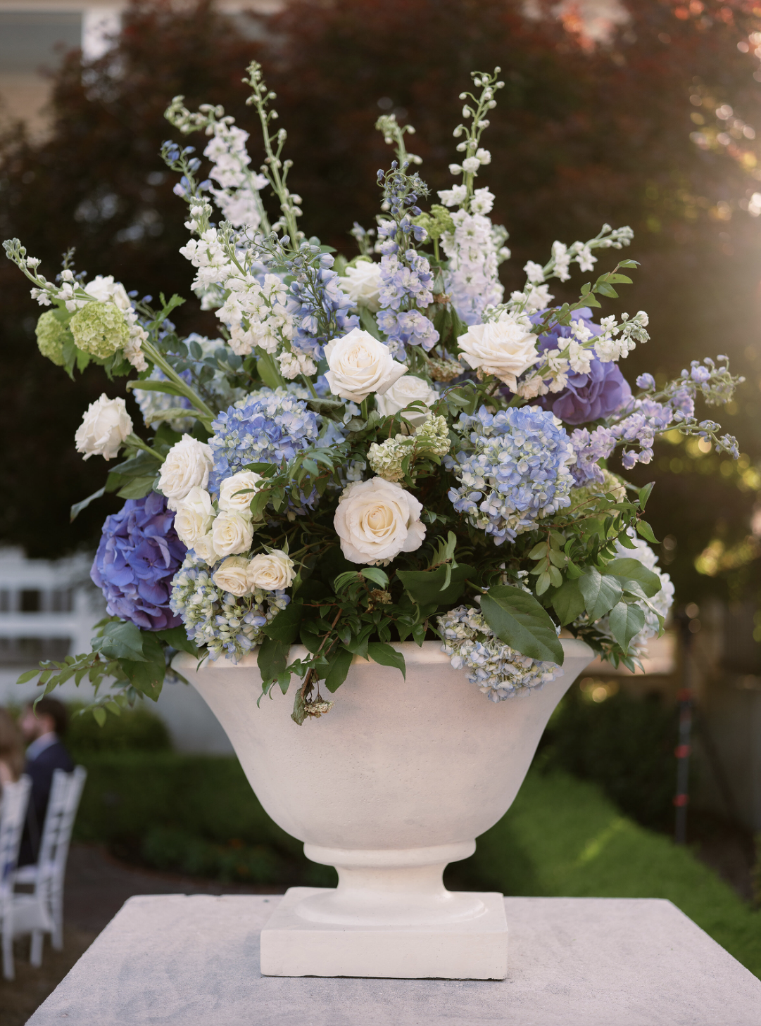 Sarah-Bradshaw-blue-hydrangea-footed-vase-bouquet.png