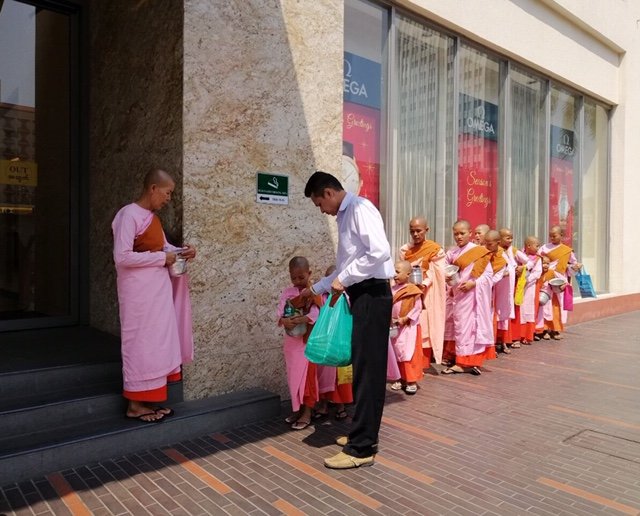 Myanmar-Donation-to-monks.jpeg