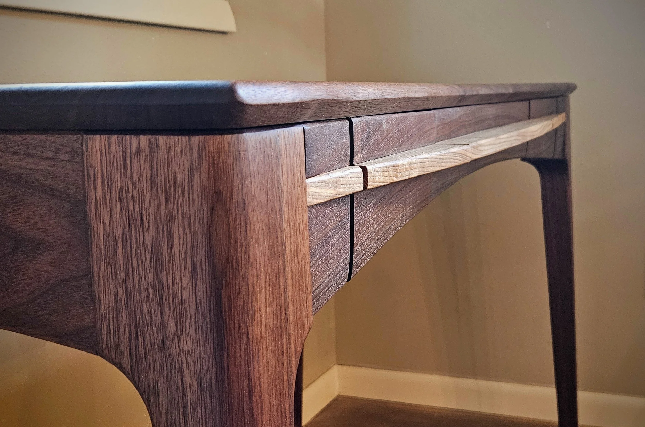 Shaped face on desk