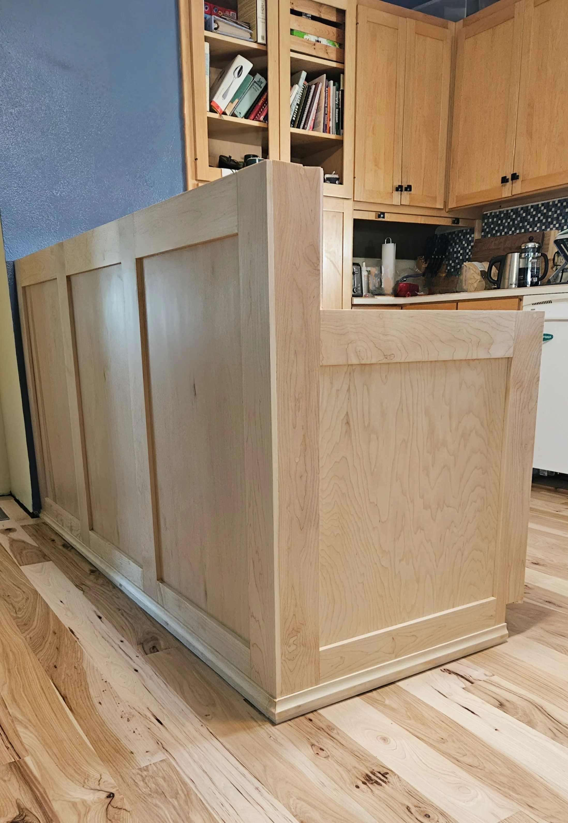 Maple panels on kitchen peninsula 