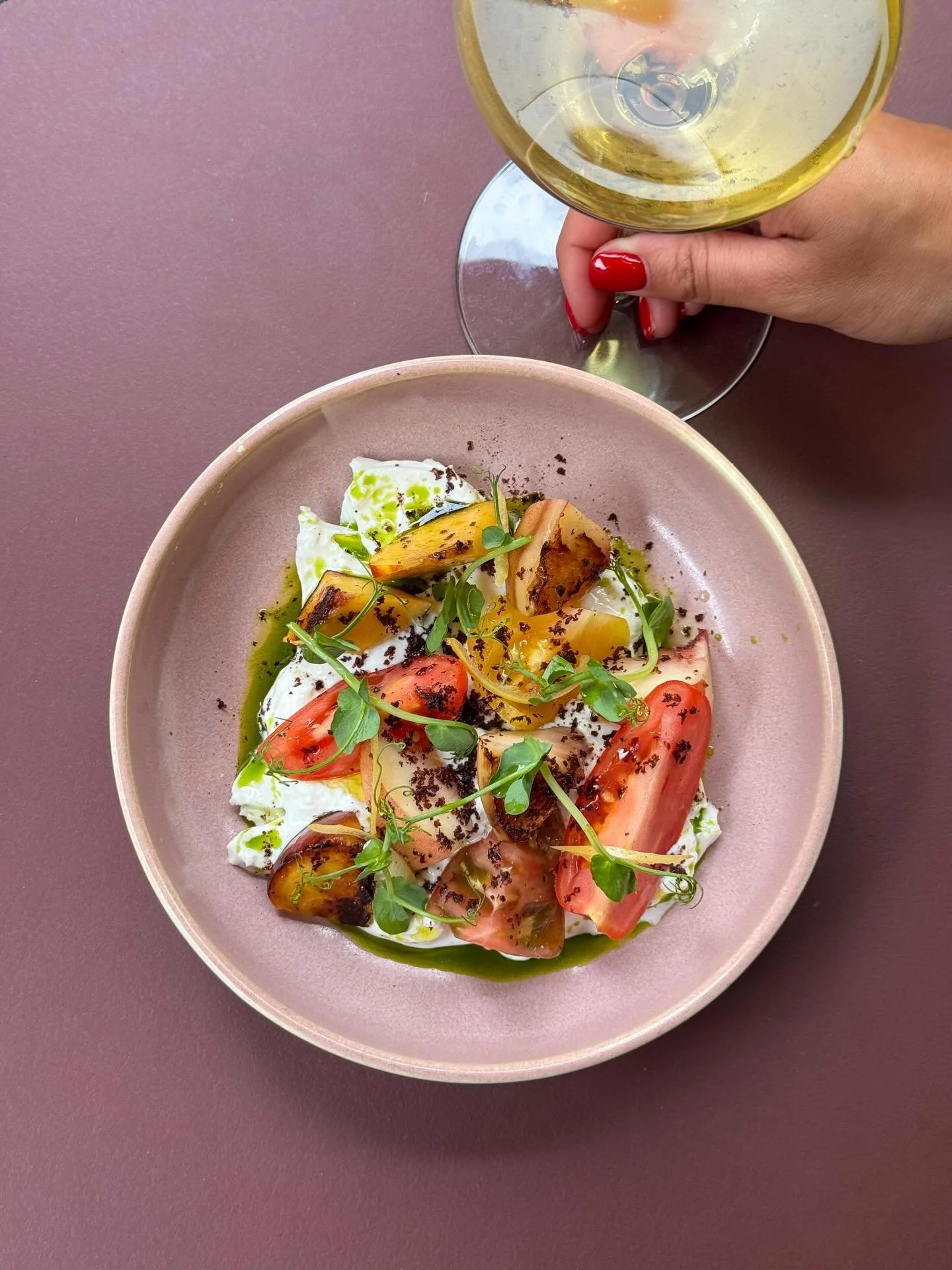Burrata, heirloom tomato, and peach. Summer flirting with spring.