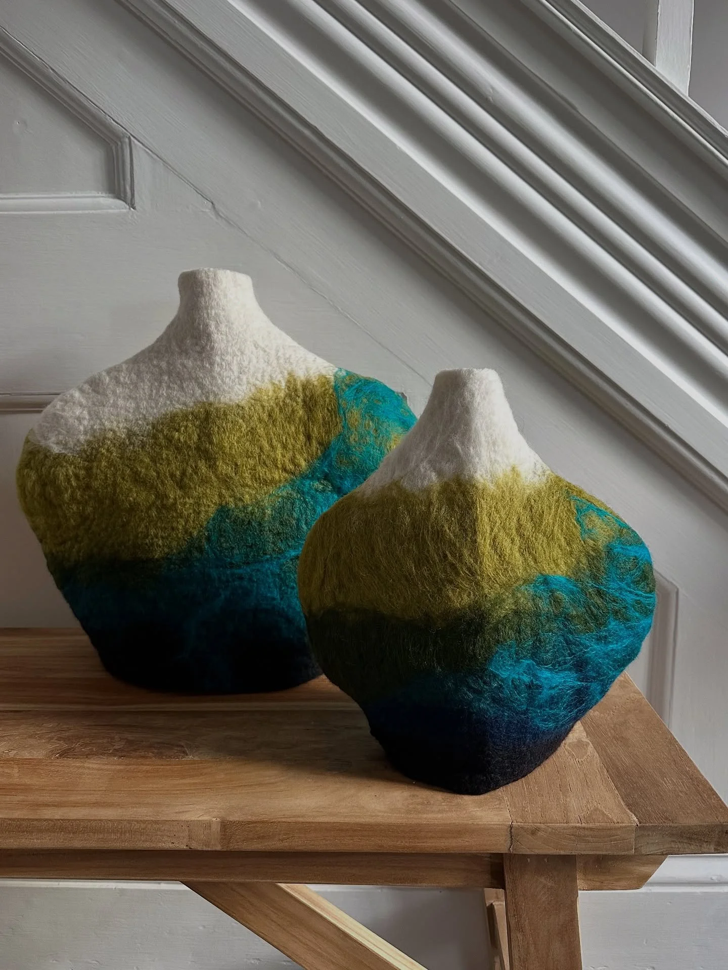 I S L A N D  S C A P E  Sculptural Vessels 

Inspired by the ebb &amp; flow of the tide, the depth &amp; warmth of distant shores. 

&lsquo;Dune&rsquo; &amp; &lsquo;Flint&rsquo; Vessels 
Island Scape Collection 
Hand felted 100% Merino wool fibres

C