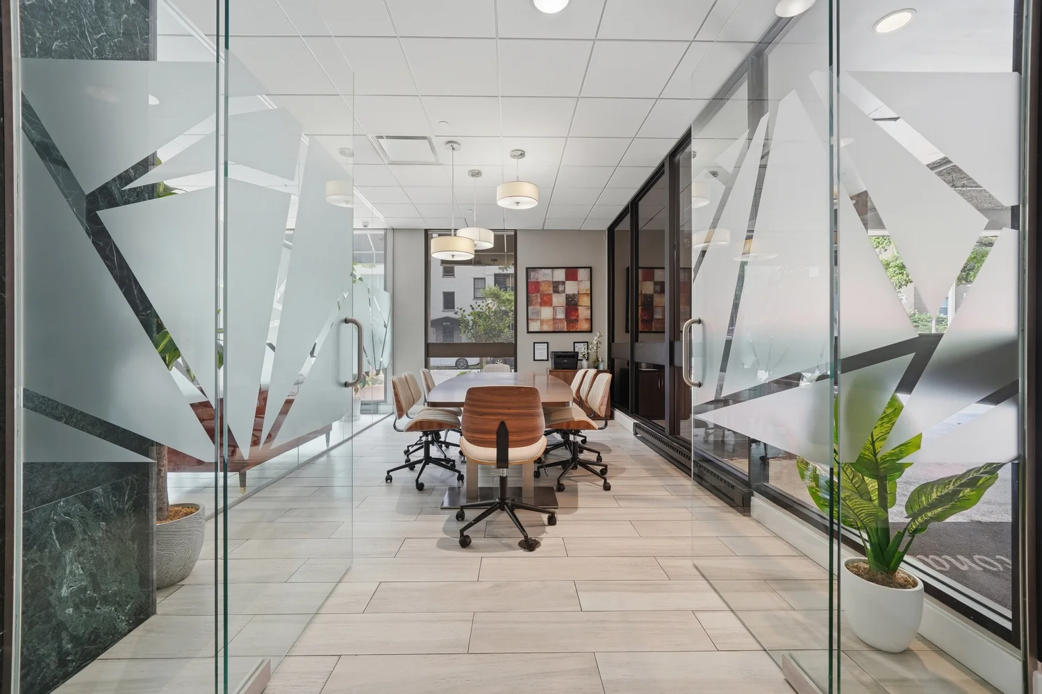 Glass-walled conference room in a commercial office