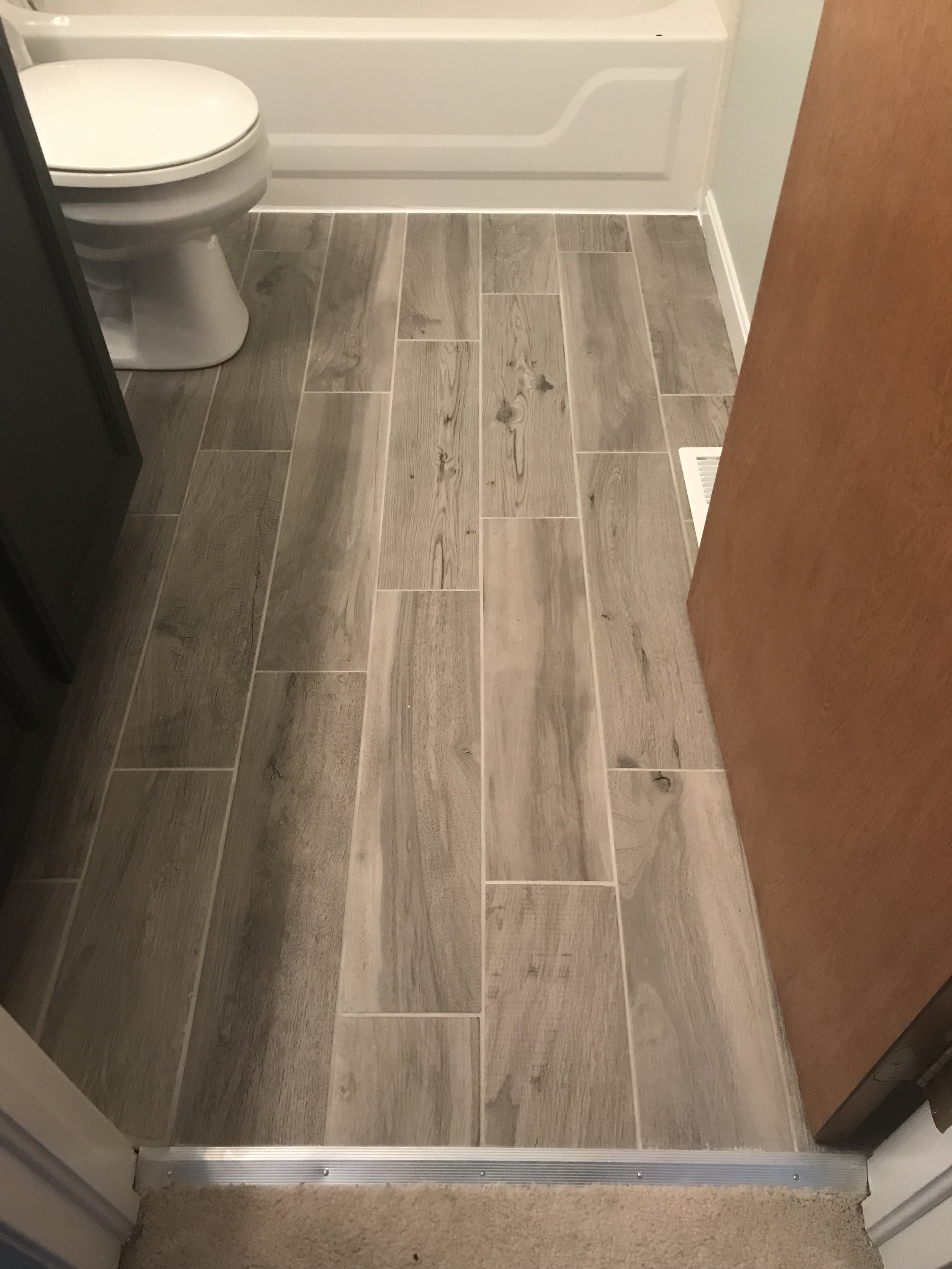 Updated tile in half bath.