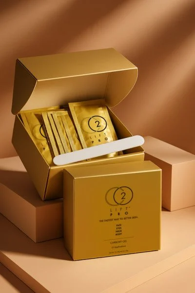 CO2Lift Pro Clinic Pack containing skincare products and a white spatula, with individual packets inside.