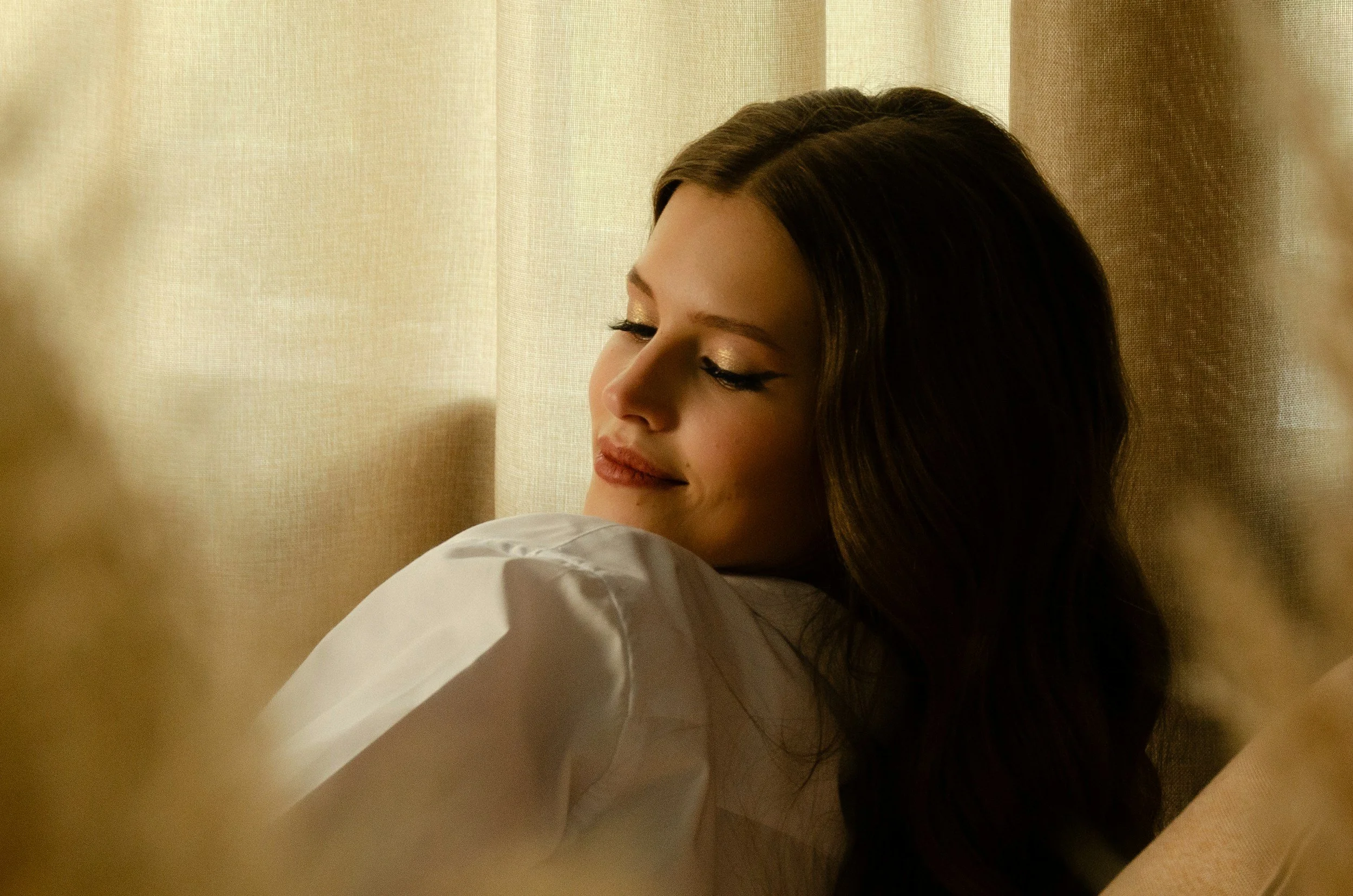 woman with eyes closed looking content | Feeling ready to explore support for chronic pain